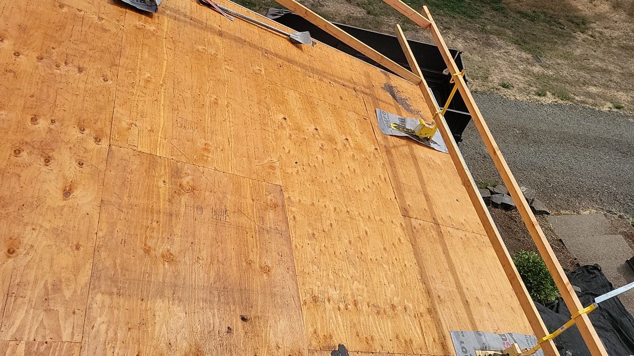 Residential Roofing Installation using IKO Dynasty (Color: Granite Black) by Orezona Building & Roofing Company, Inc.