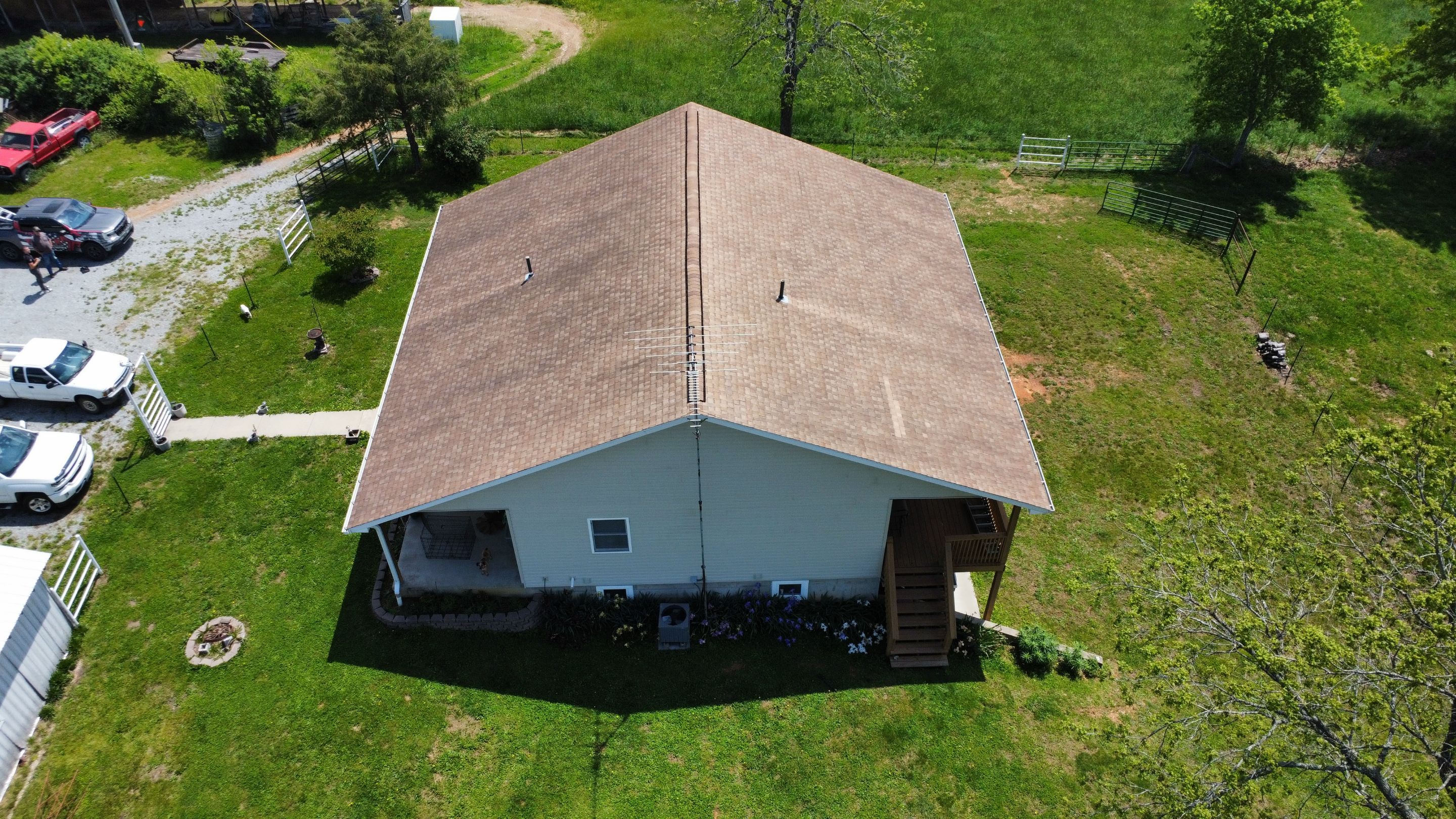 Residential Multi Structure Roofing + Gutter & Downspouts Install  by Titan Commercial & Residential Roofing 