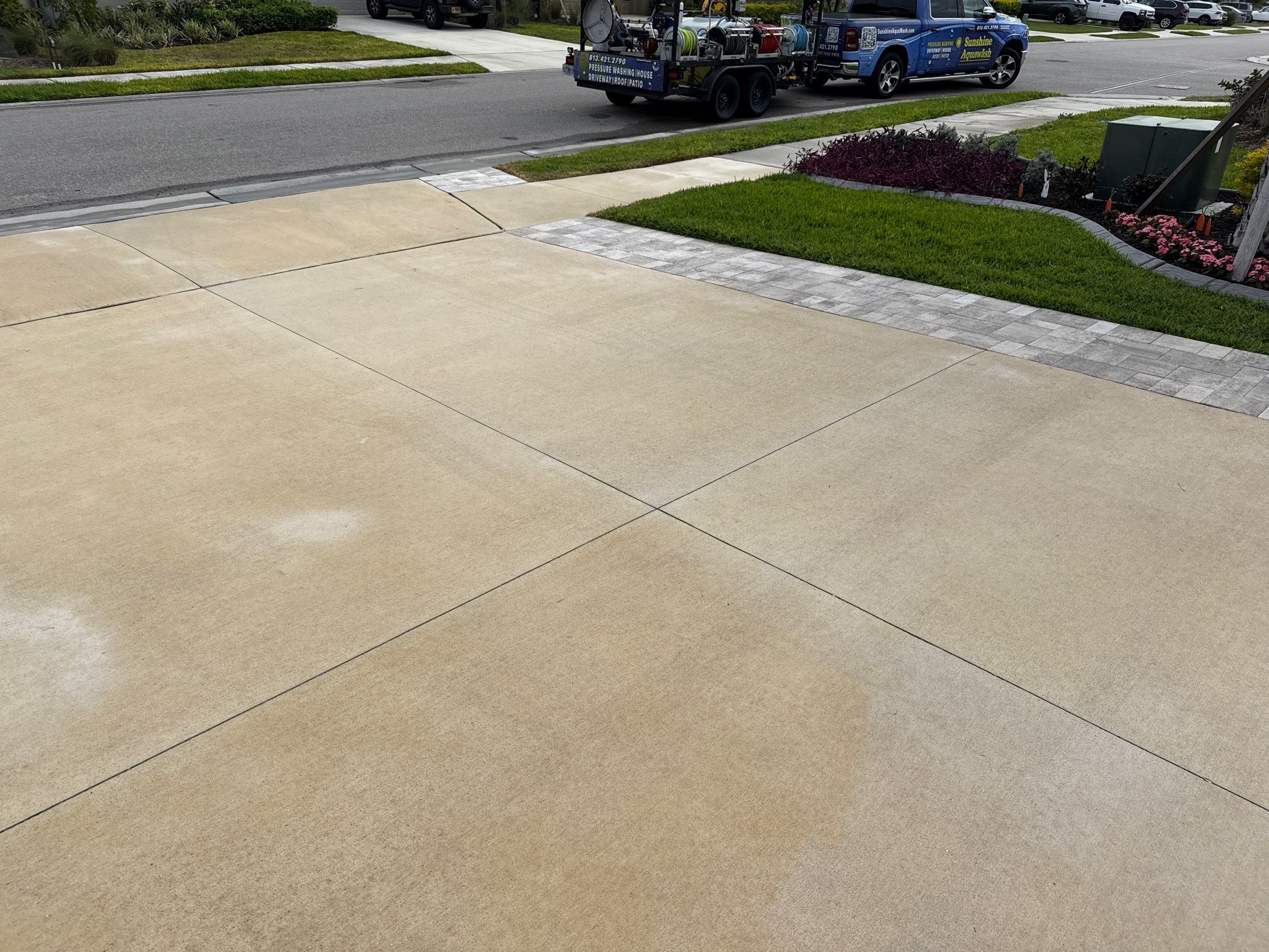 Rust Stain Removal from Concrete Driveway and Pavers in Park East at Azario | Lakewood Ranch, FL by Sunshine AquaWash