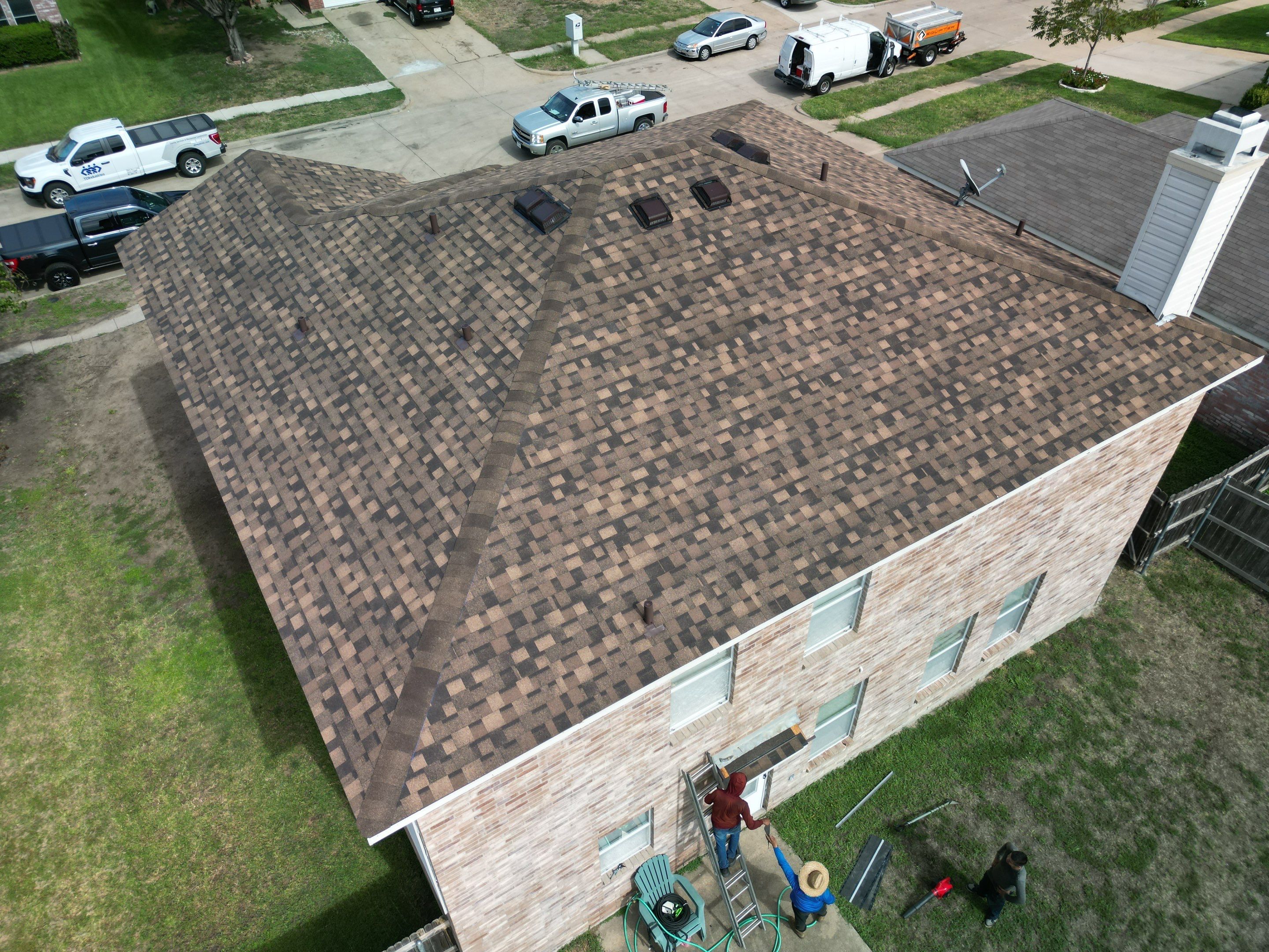 Full Roof Replacement, Chimney Rebuild and Interior Damage Replacement by First United Roofing & Construction
