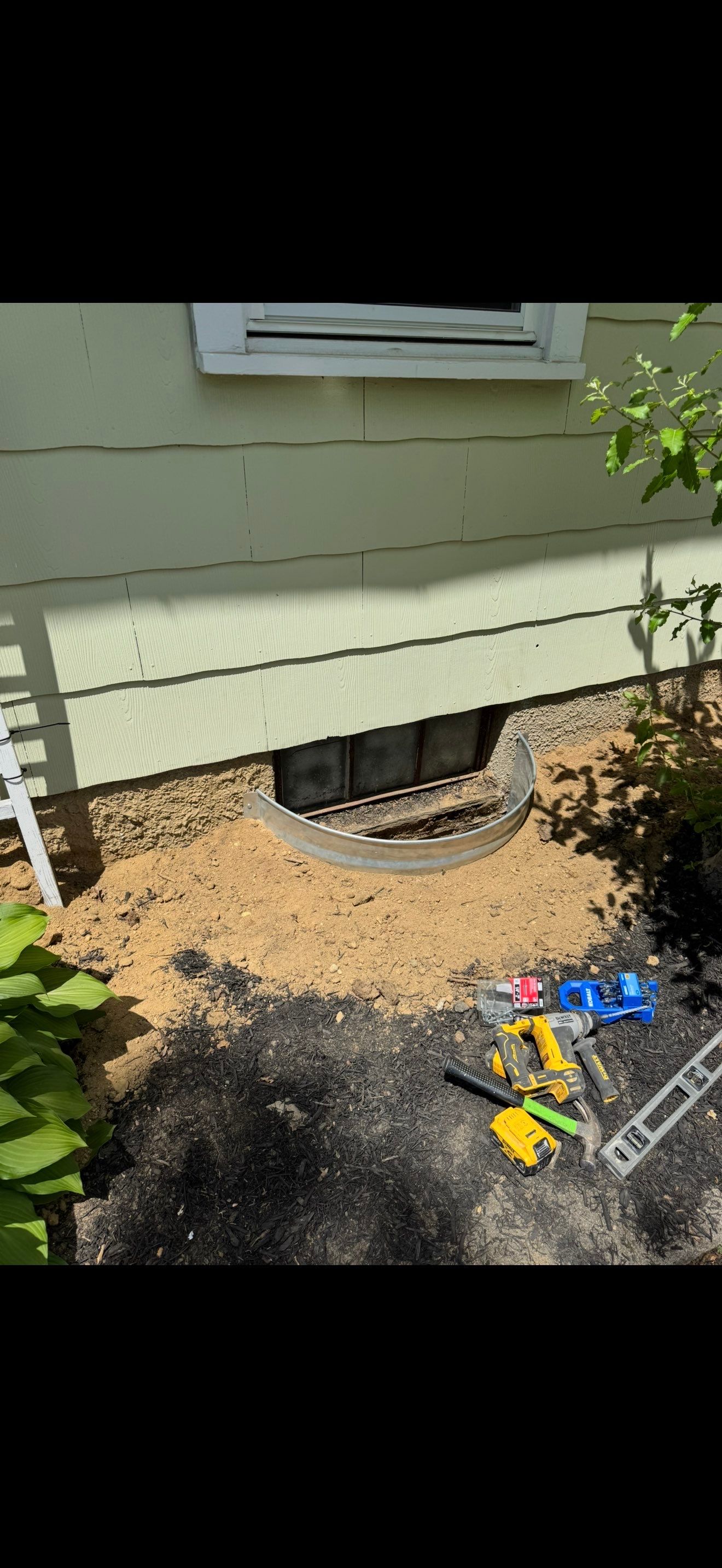 Window wells, exterior painting, basement waterproofing. by AXR Inc