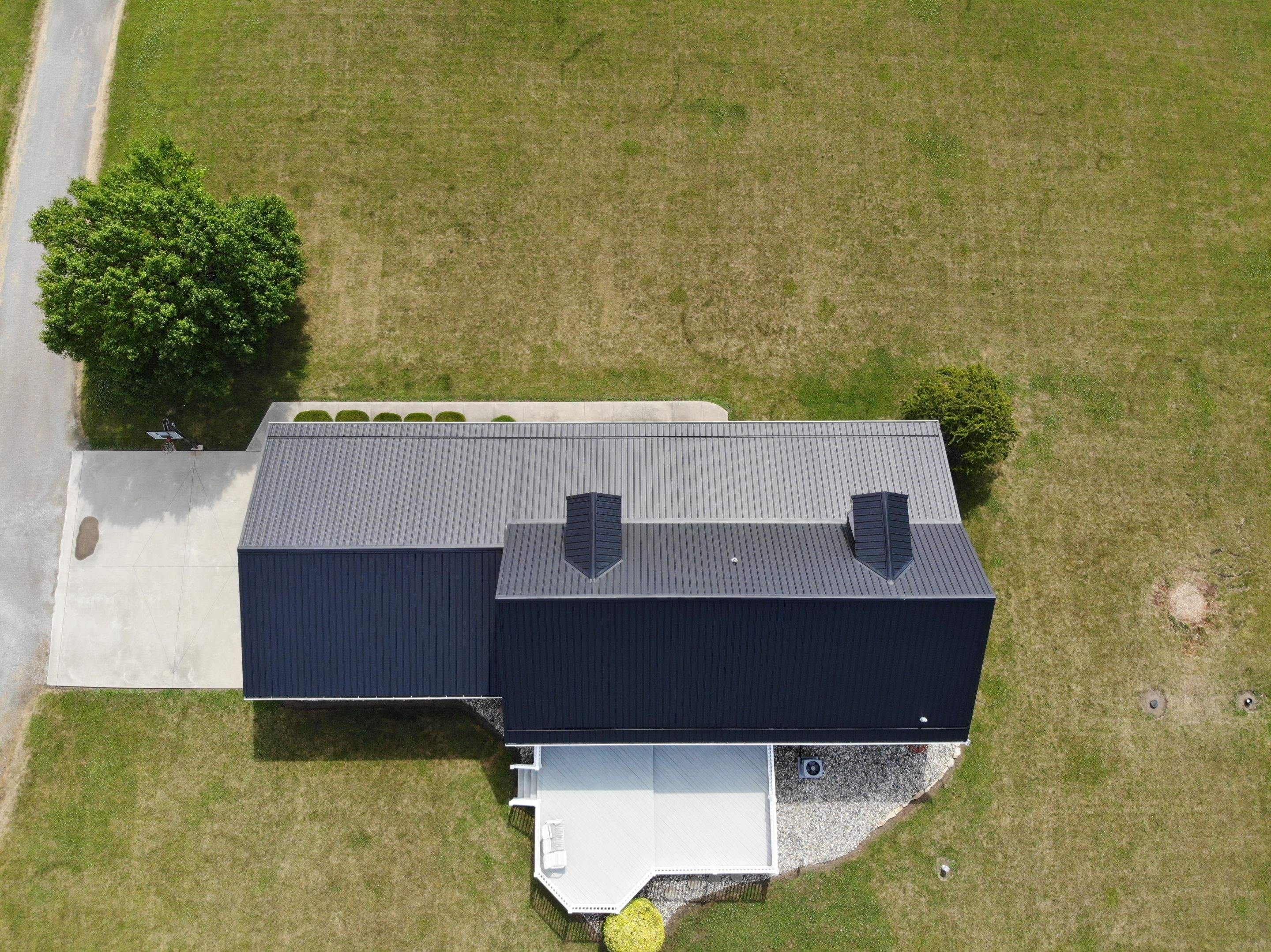 Residential Roofing Installation using Exposed Fastener Metal Roof by 4Ever Metal Roofing