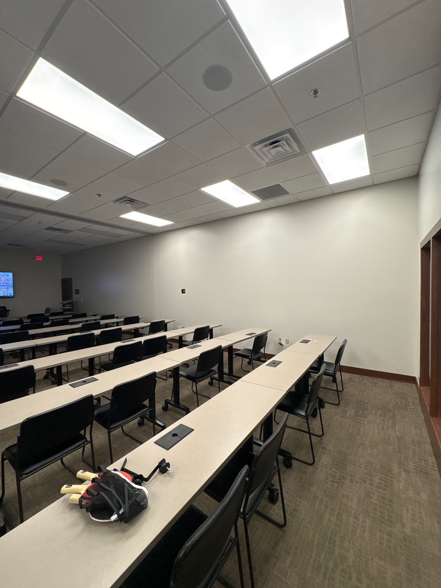 Commercial Office Interior Remodel and Modern Suite Refresh in Sioux Falls by Select Painting, Coatings & Garage Cabinets
