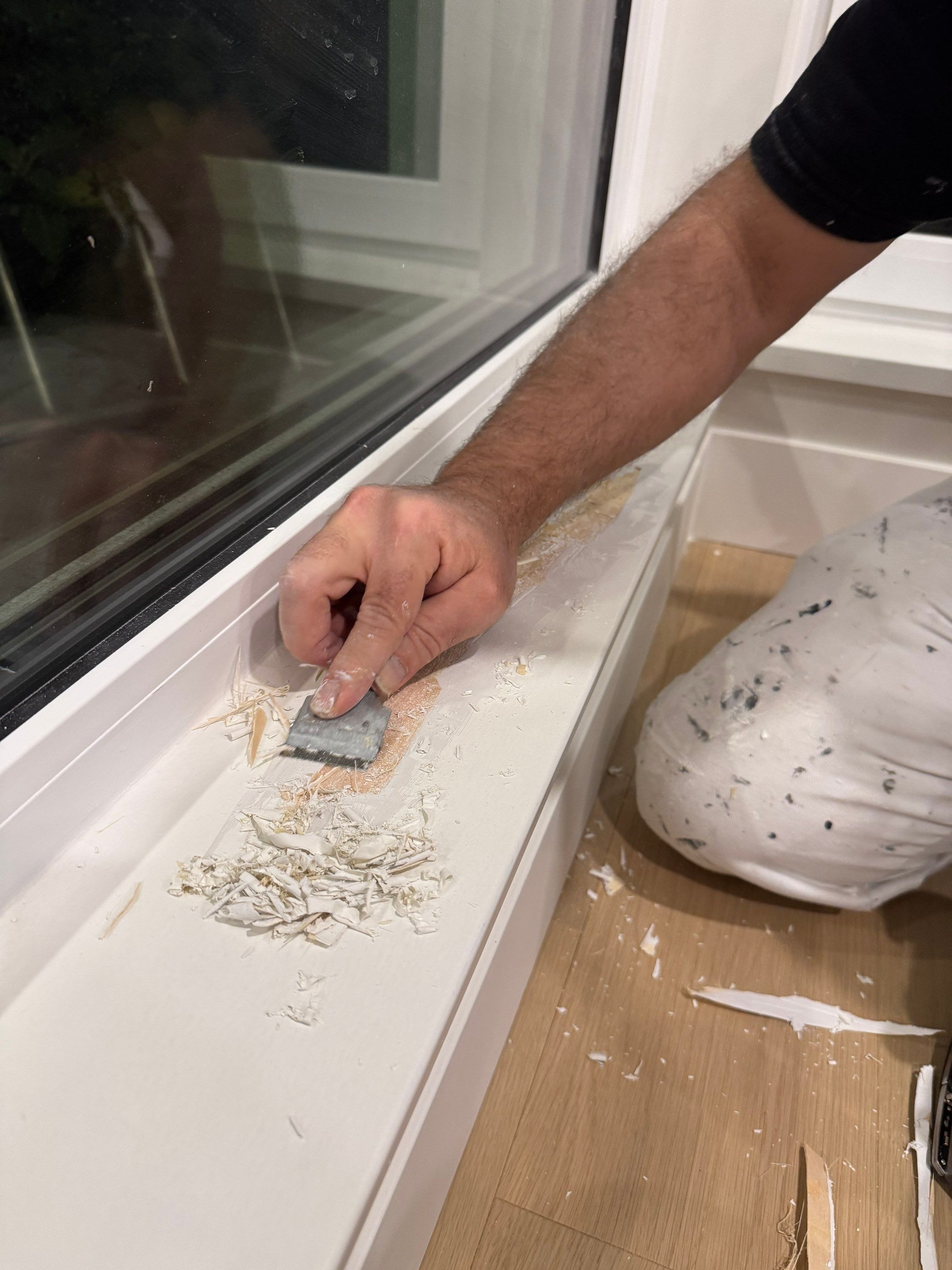 West Vancouver Custom Millwork: Heat Pump Trim & Window Finishing by YVR Construction Group