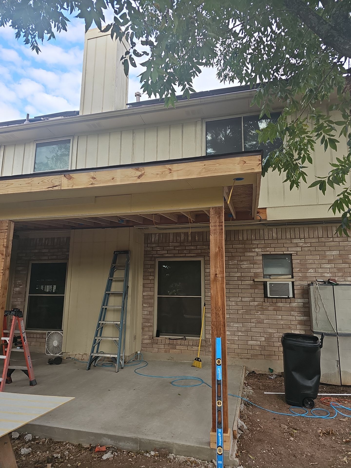 Beautiful New Covered Patio by DeZign Roofing & Exteriors