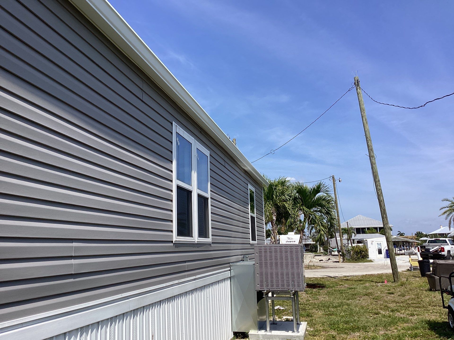 Aluminum Gutters for Beachside Homes in St James City FL by Gutter Professors