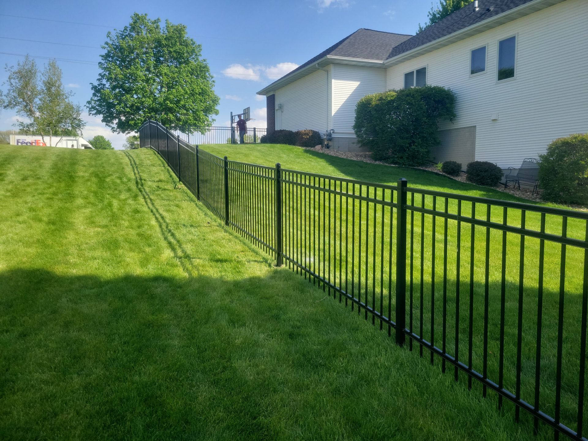 Black Ornamental Metal Picket Fence Installation in Waterloo by Perfect Picket Fence and Stain
