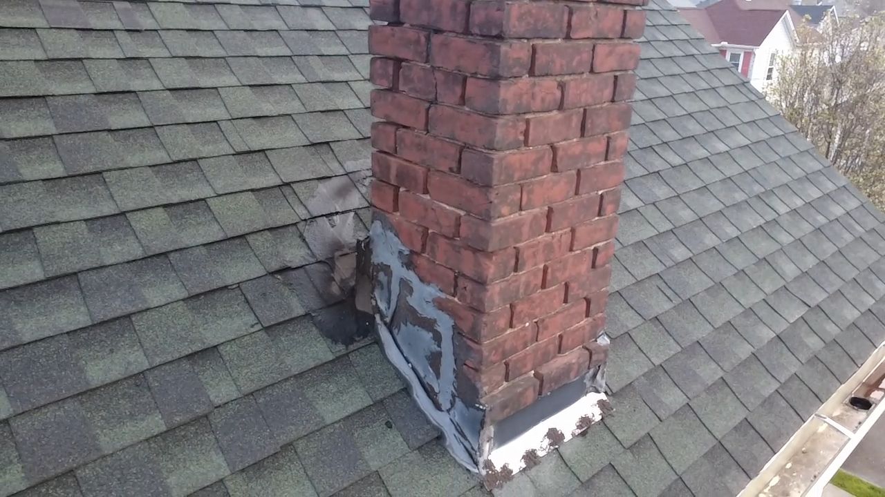 Just a simple chimney Removal by Level Up Roofing and Restoration Services LLC
