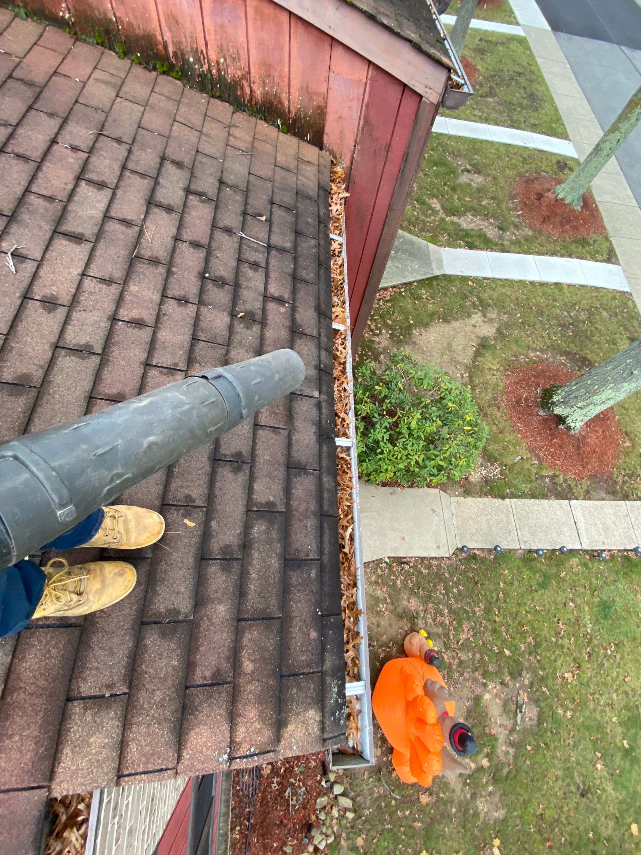 Commercial gutter cleaning Pennsylvania before photo with filled gutters