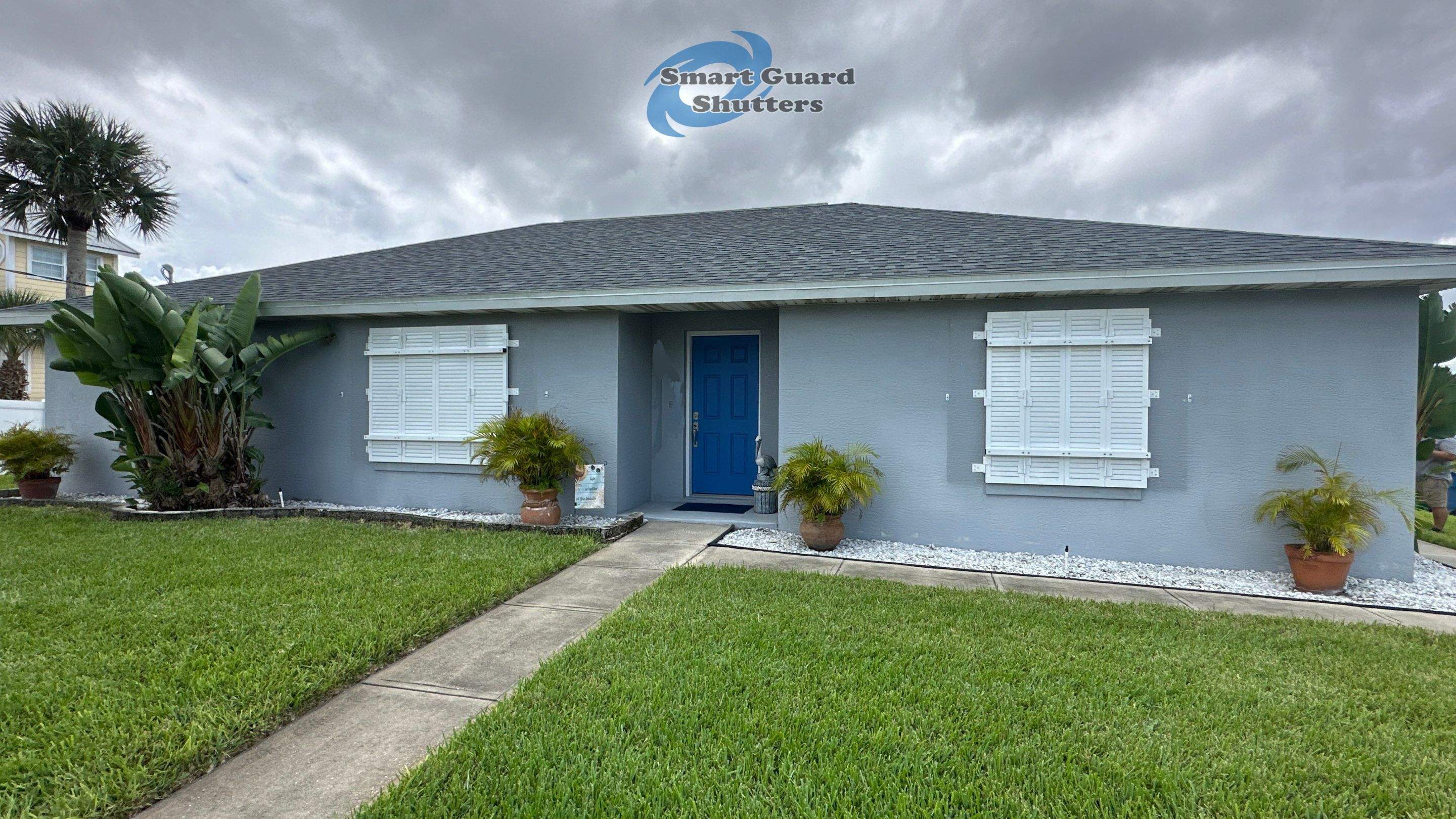 Impact Colonial Shutters in Signal White by Smart Guard Shutters