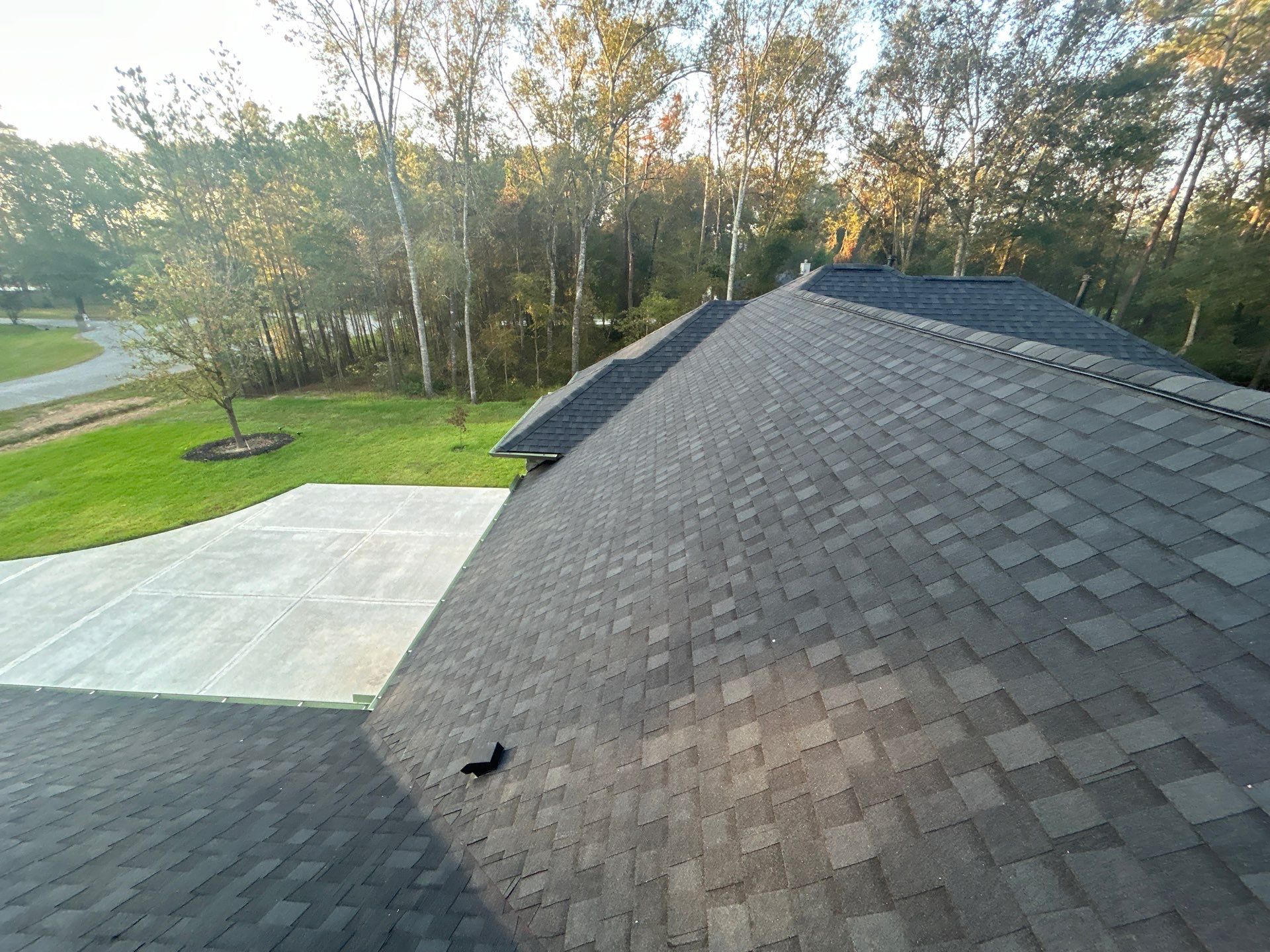 TAMKO Titan XT Rustic Black by STX Roofing