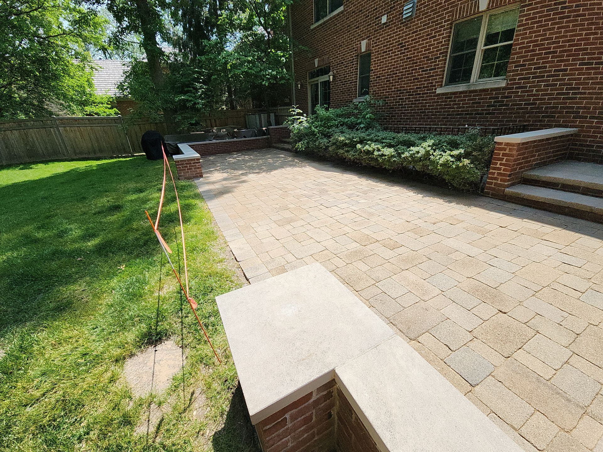 Brick paver repair, clean, seal and poly sanding by Northern Power Washing LLC.