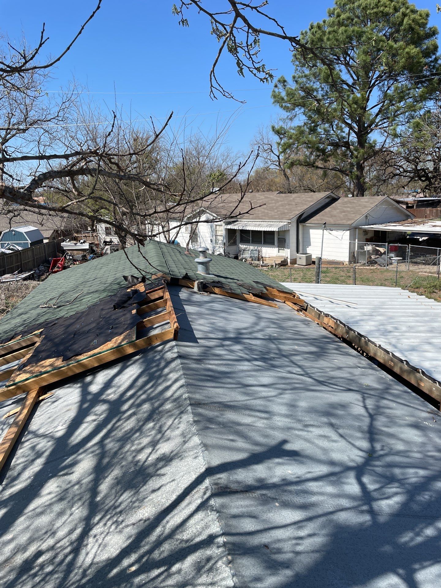Roof Damage using ATLAS Pinnacle Pristine Shingles by Harvey Roofing & Construction