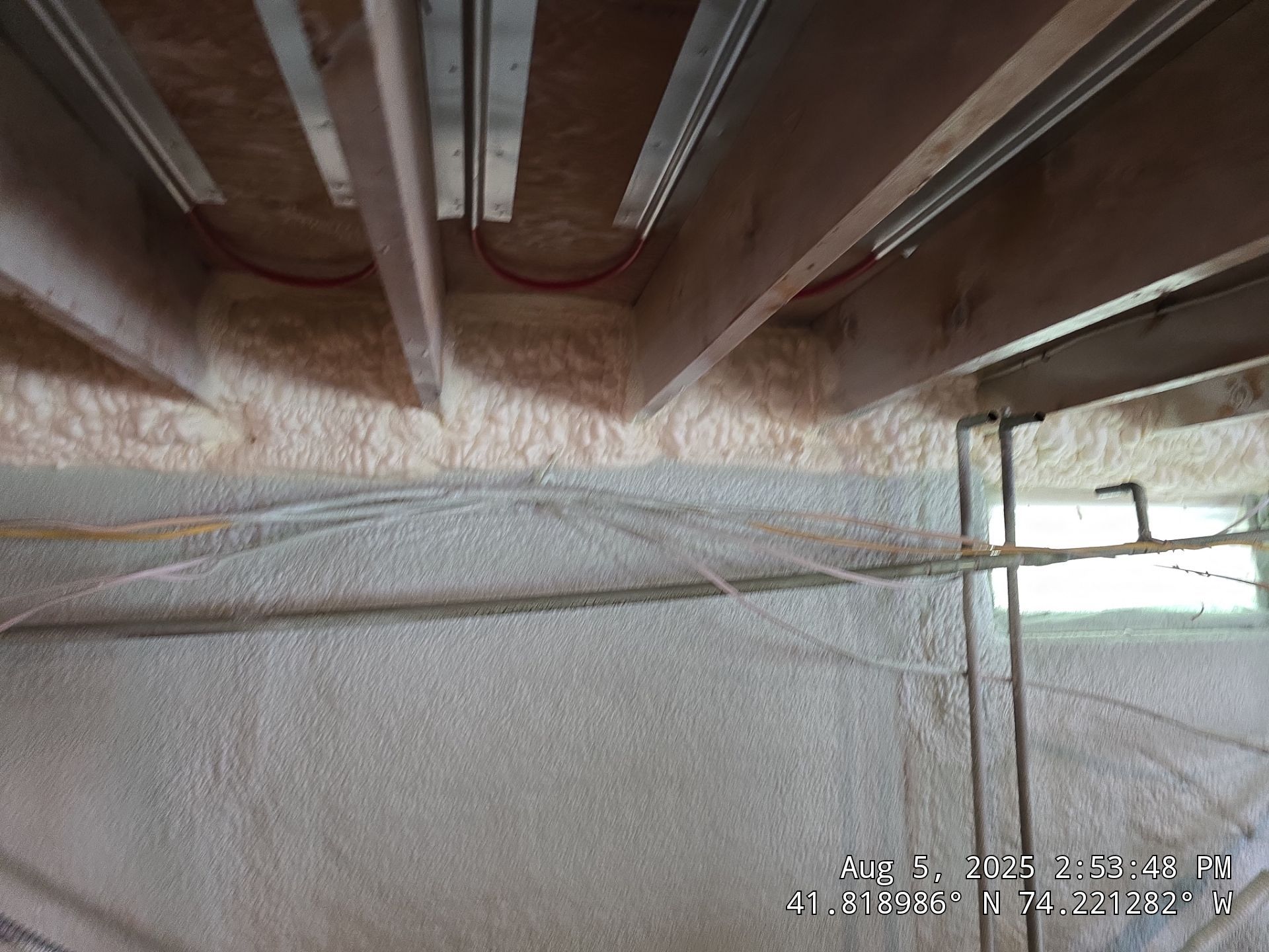 Master bedroom Exterior Walls using open cell spray foam by NYS Foam & Energy