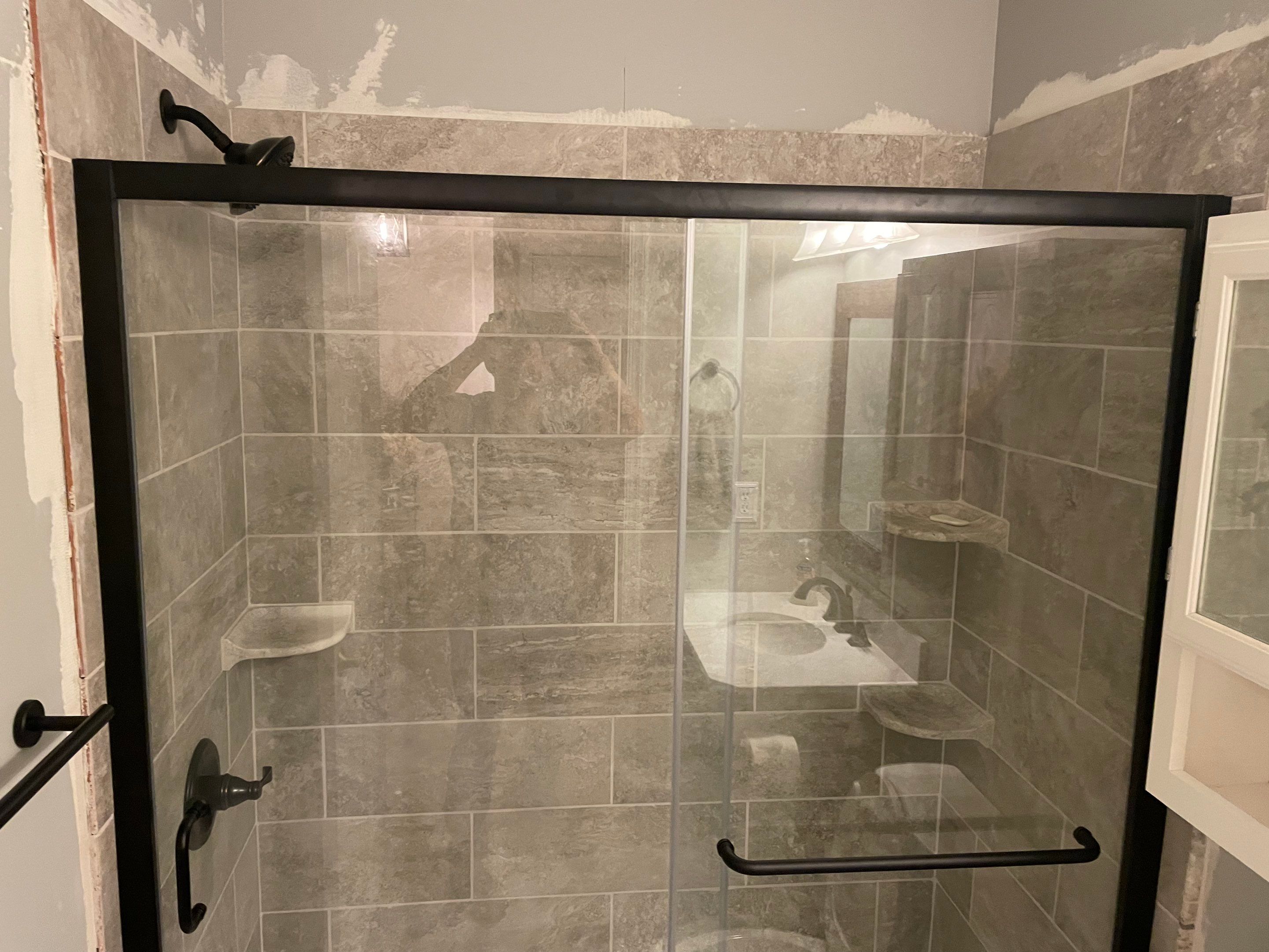 Bathroom Remodel using Tile by Home Concepts Construction