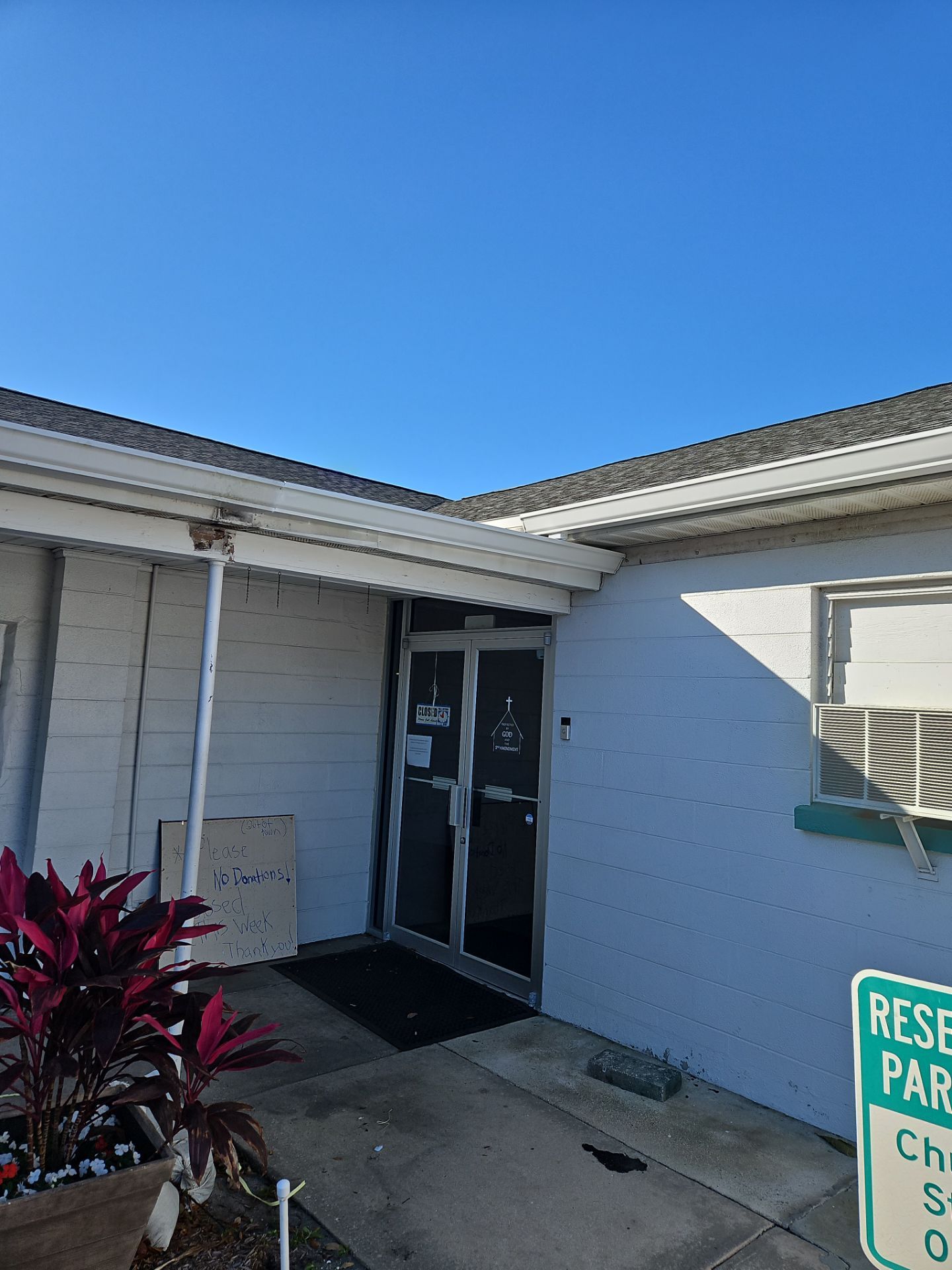 Downspout Installation using White Down Spouts in Sarasota FL by Gutter Professors