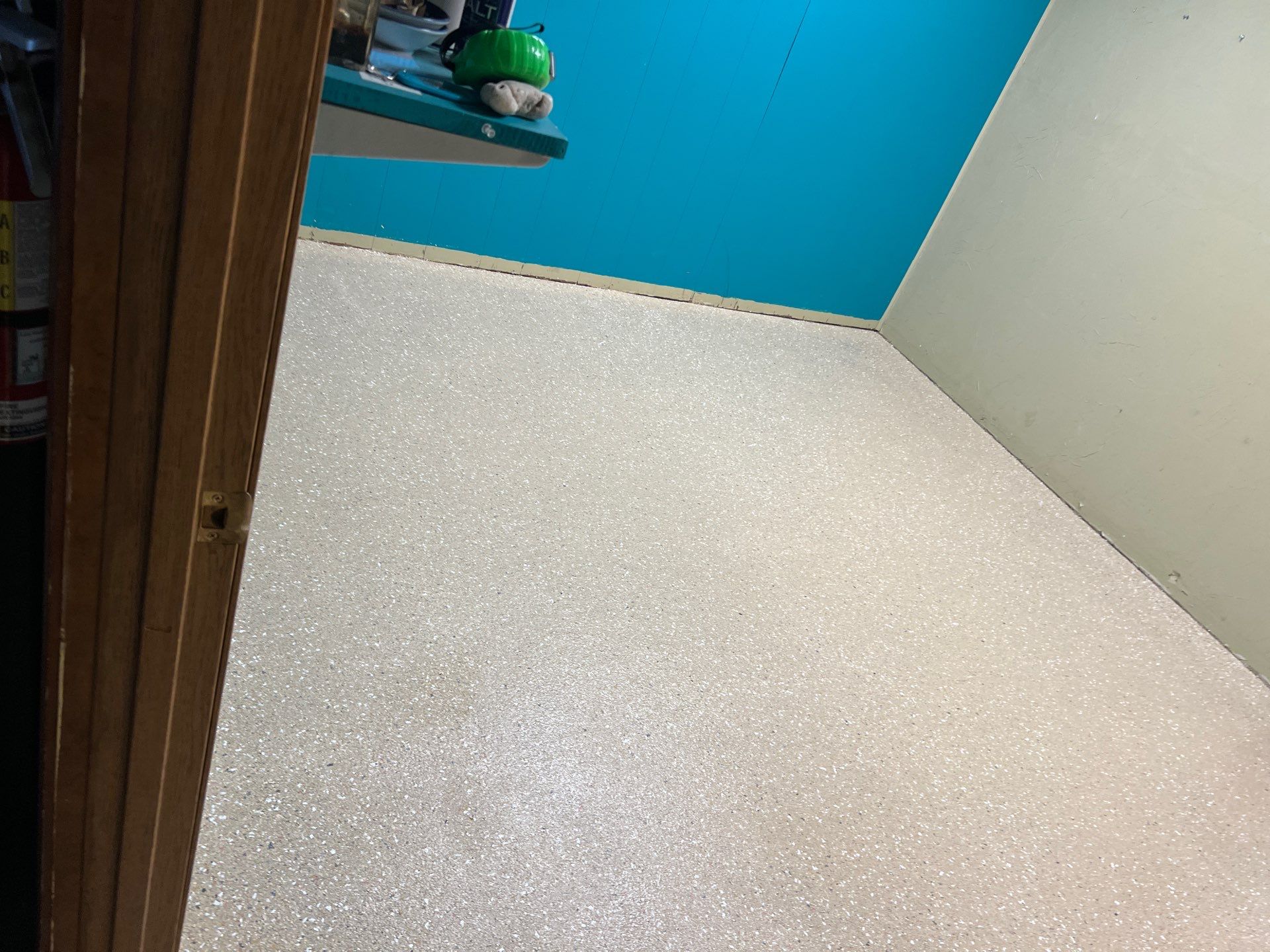 Epoxy Flooring Installation – Downtown Muskegon Commercial Space by Gordon Painting