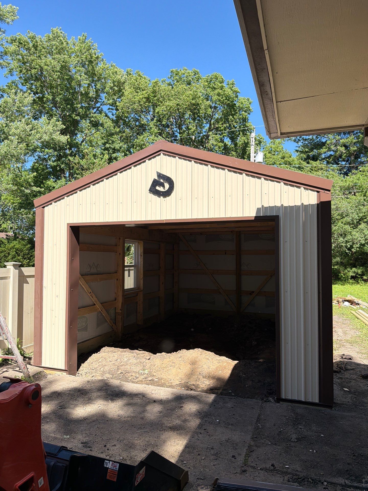 Custom Post Frame Storage Building Installation in Ames, Iowa by Graber Custom Structures