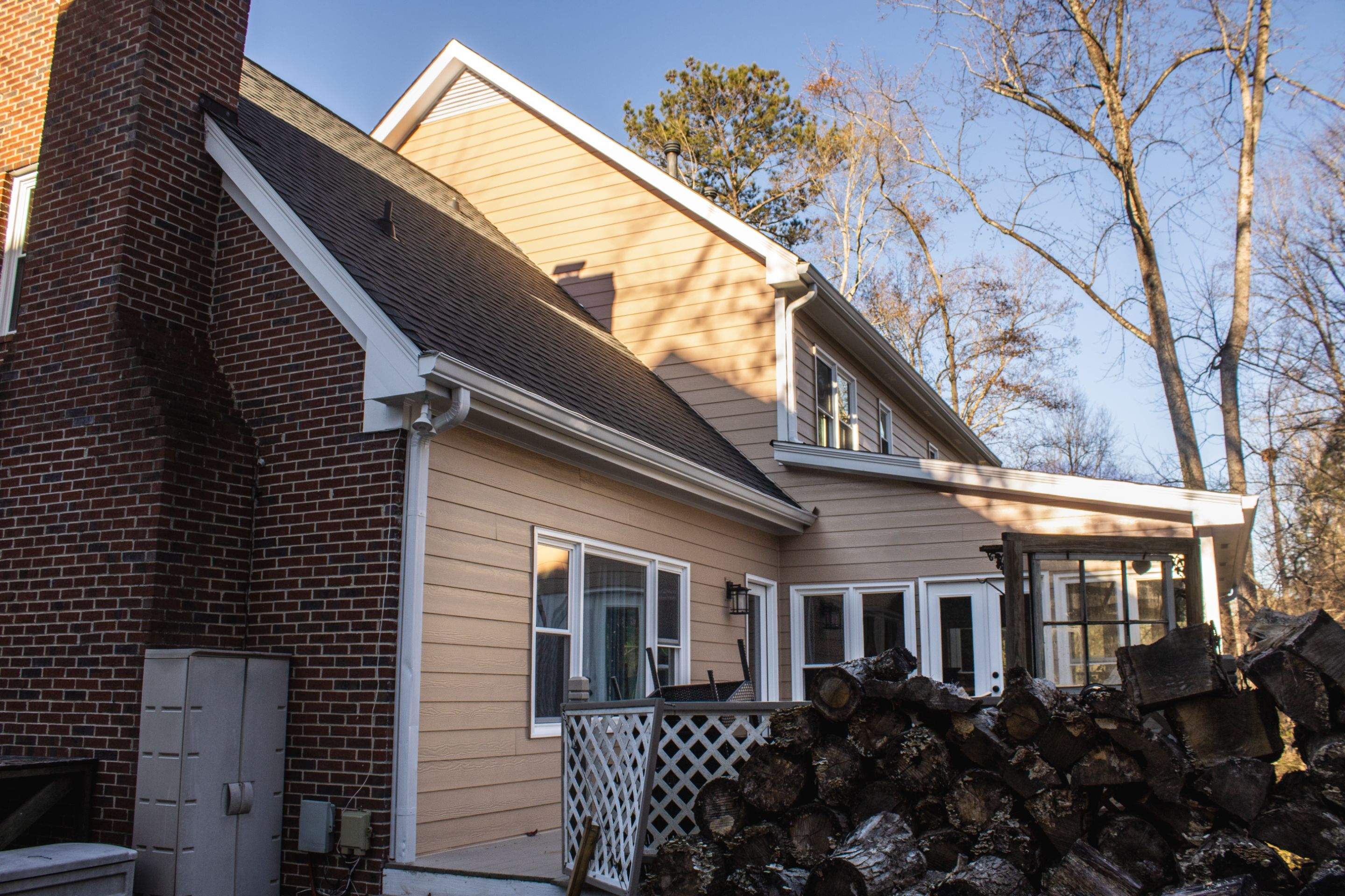 53 Window Replacements with Master 2800 Series Vinyl Replacement Windows and James Hardie Siding Installation by Nelson Exteriors 