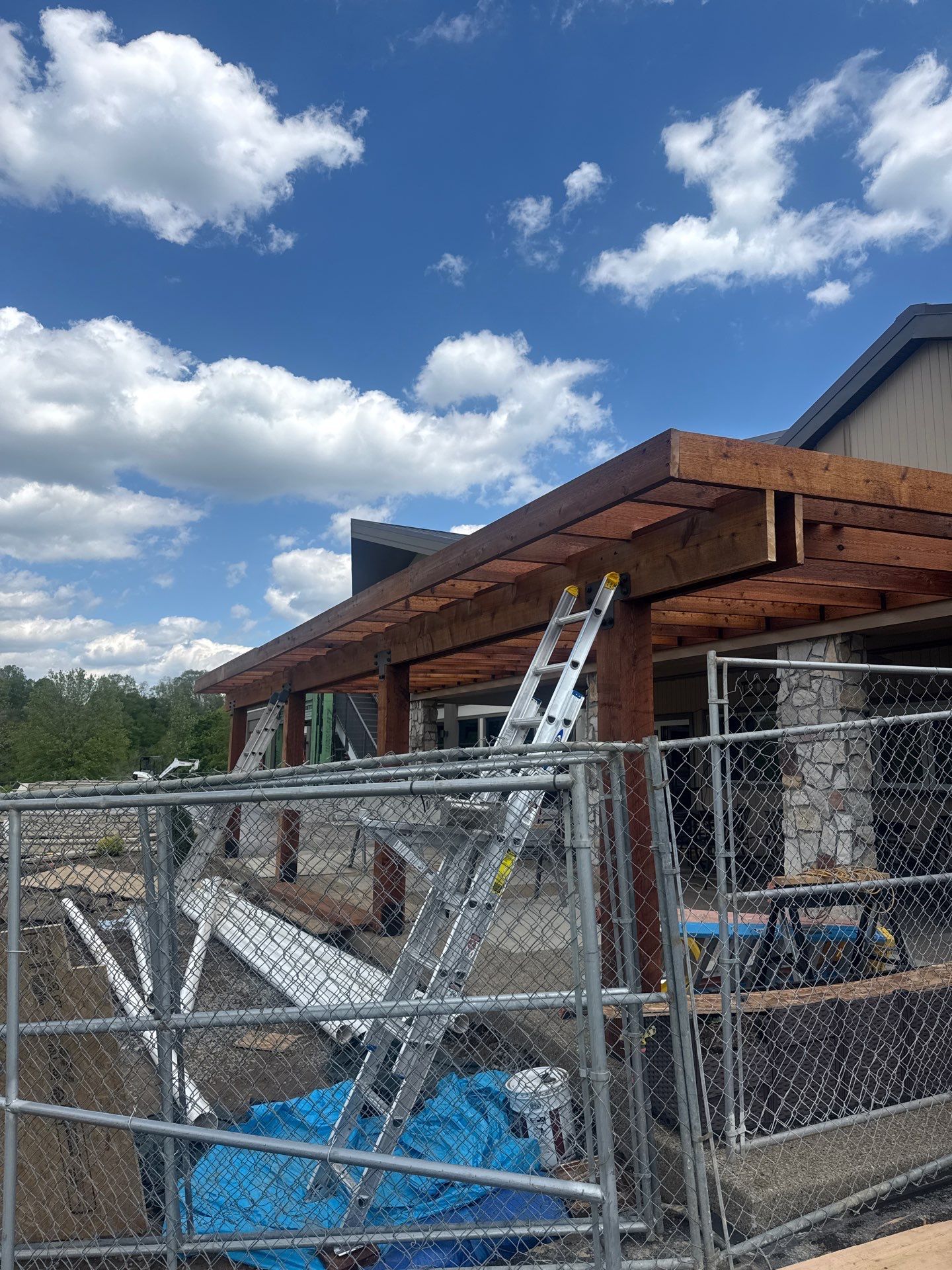 Custom Timber Pergola and Polycarbonate Roof Installation in Canonsburg by Cousins Roofing Siding & Decks
