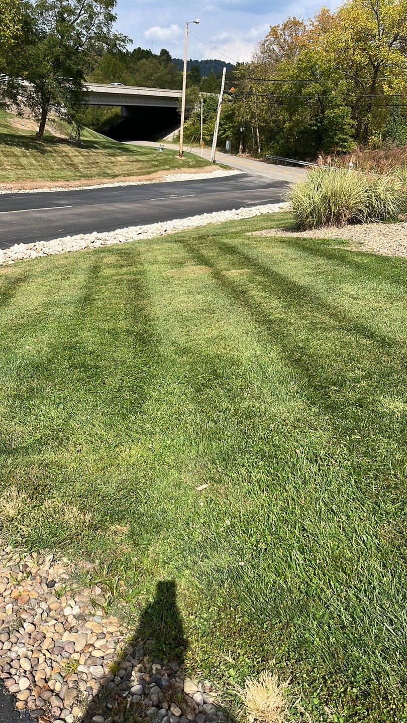 Lawn Mowing using Lawn mower by GrassBusters, Inc.