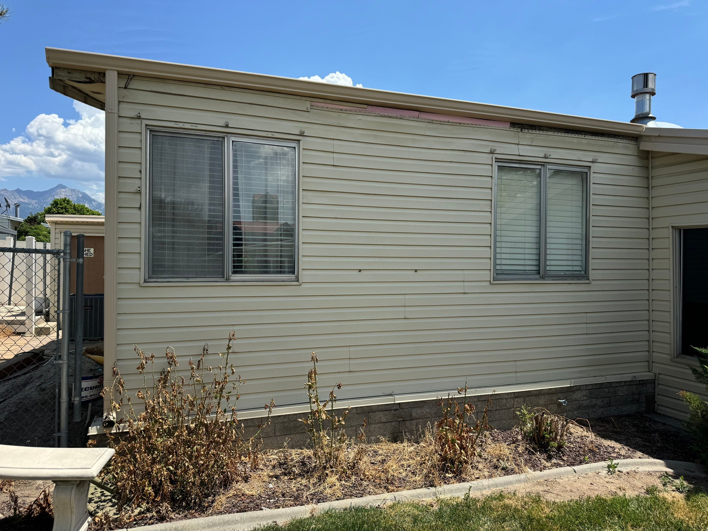 Salt Lake City | Targeted Vinyl Repair & Sheathing Update | Almond by Ideal Siding Utah