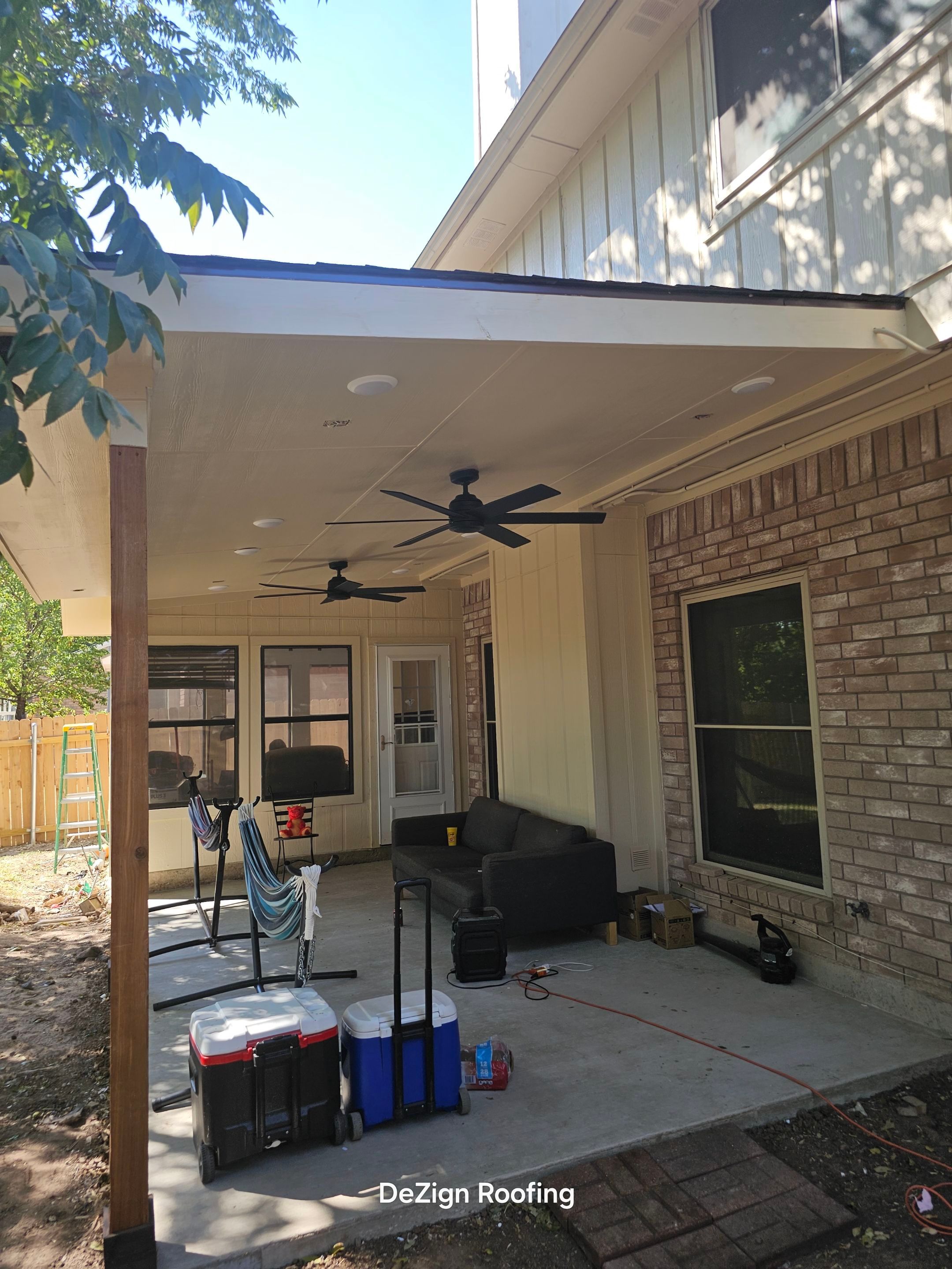 Beautiful New Covered Patio by DeZign Roofing & Exteriors