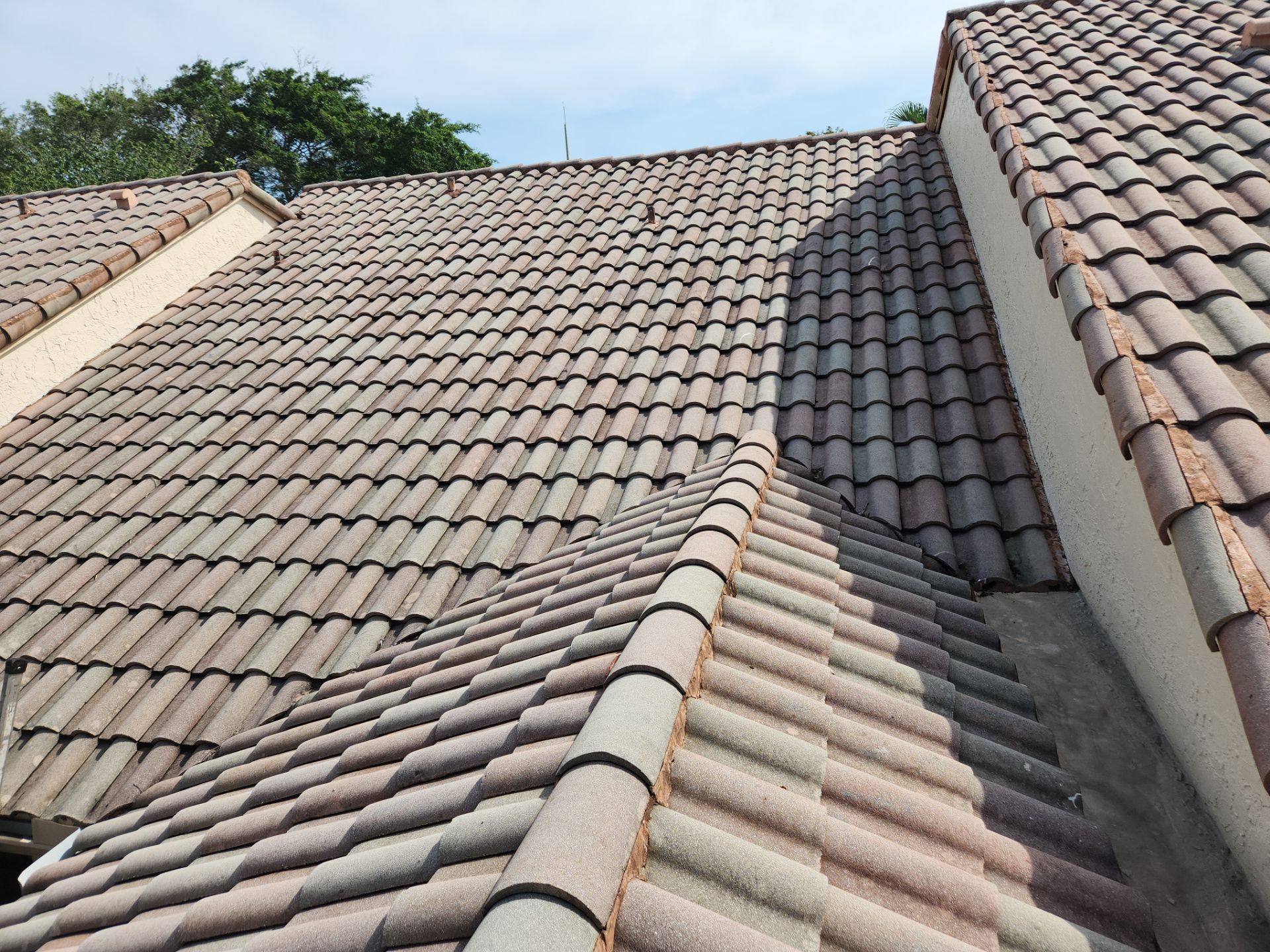 Concrete Tile Roof Repair using Skylight by Aastro Roofing