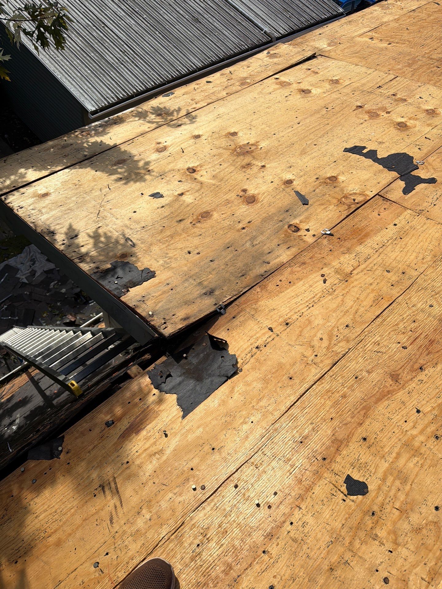 Residential Roofing Installation using GAF Timberline HDZ Charcoal by Rainstoppers Roofing