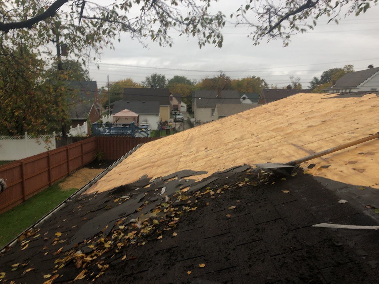 Siding Installation using Norandex woodsman dl-5 white woodgrain vinyl by Absolute Roofing and Construction