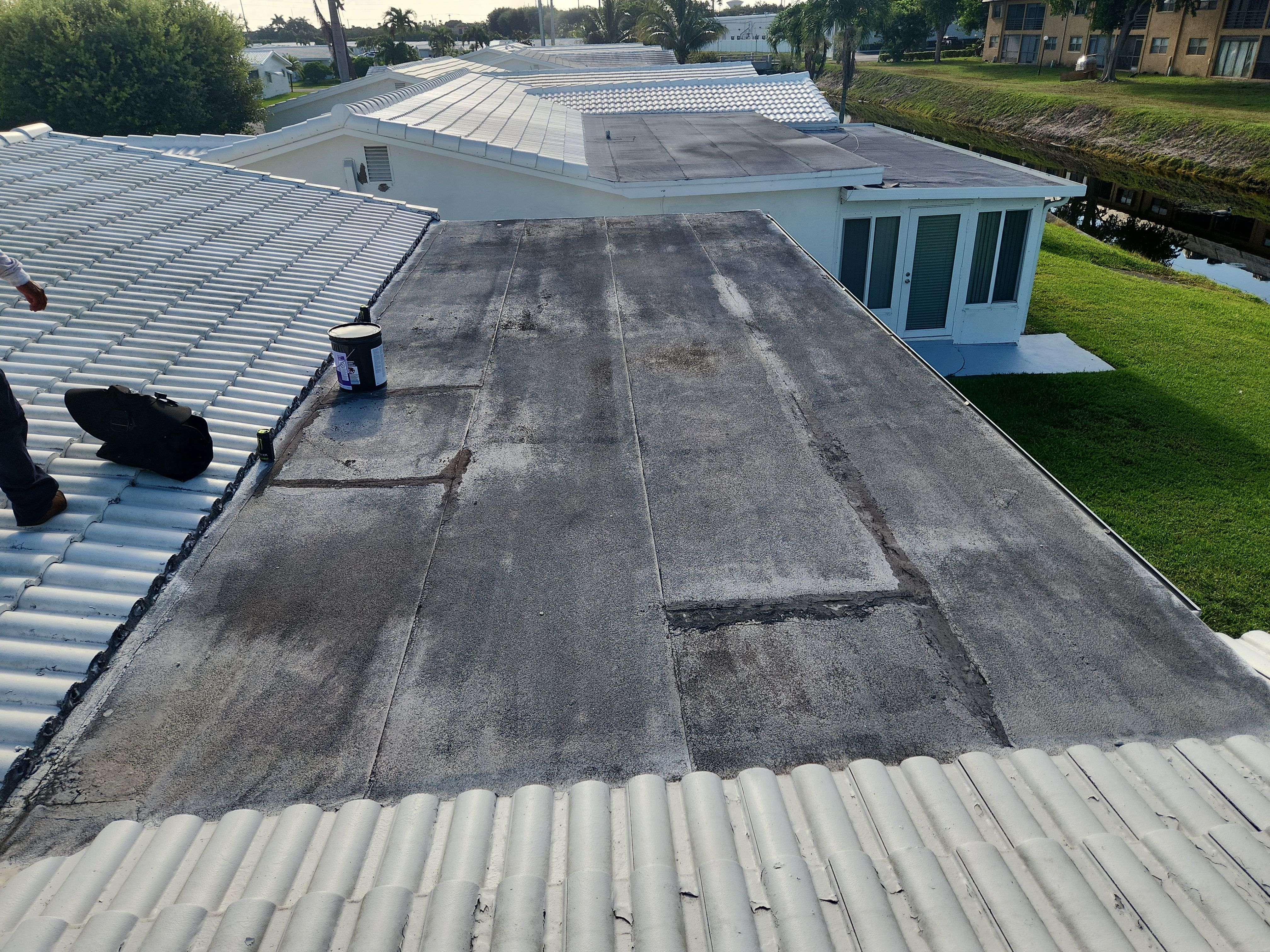 Concrete Tile Roof Repair and Flat Roof Restoration in Boynton Beach by Aastro Roofing