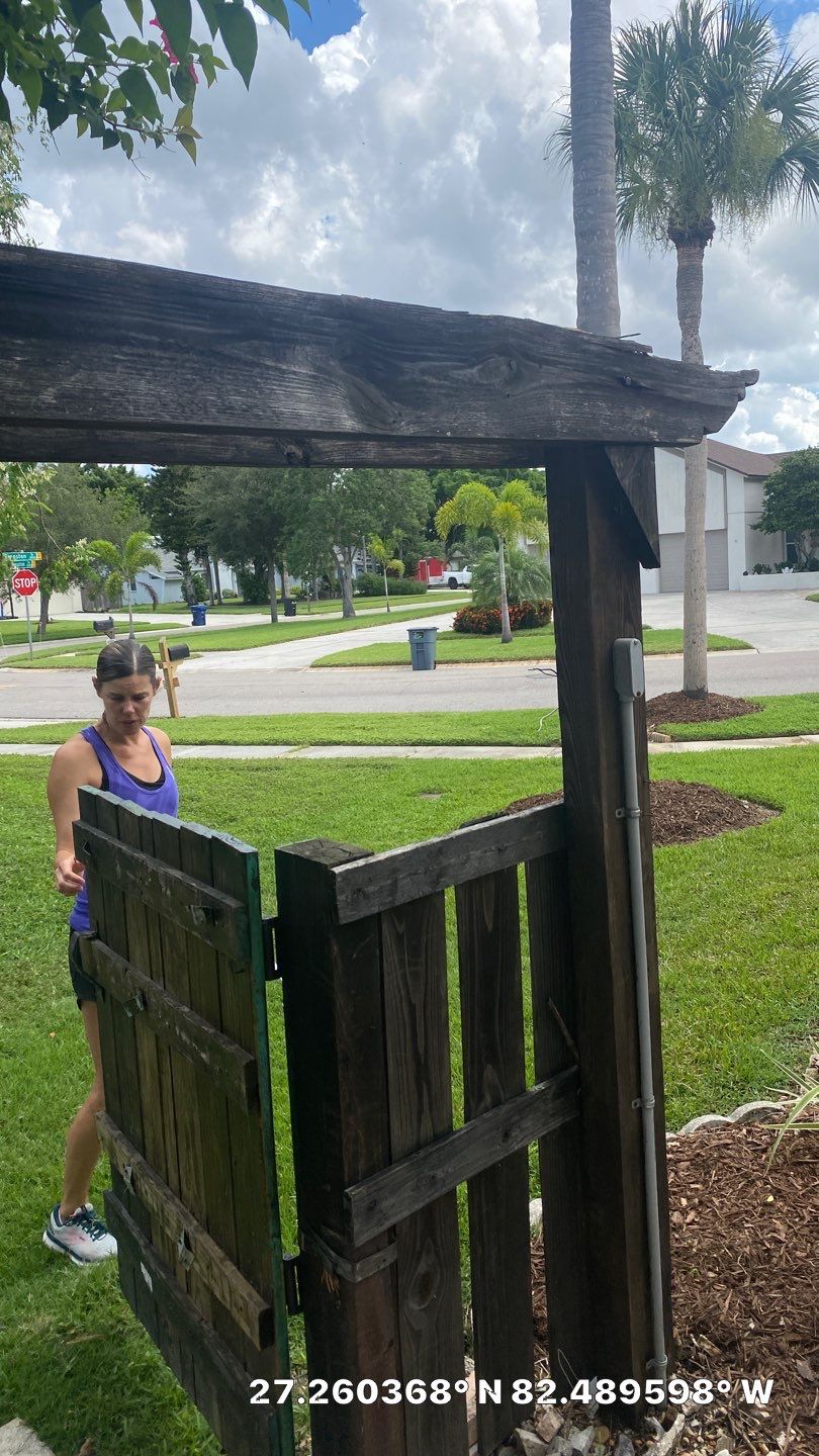 Sarasota, FL 6ft. Tall Horizontal Shadowbox Wood with 4ft. Tall 3-Rail Black Aluminum Fence by Asap fence and gates, LLC