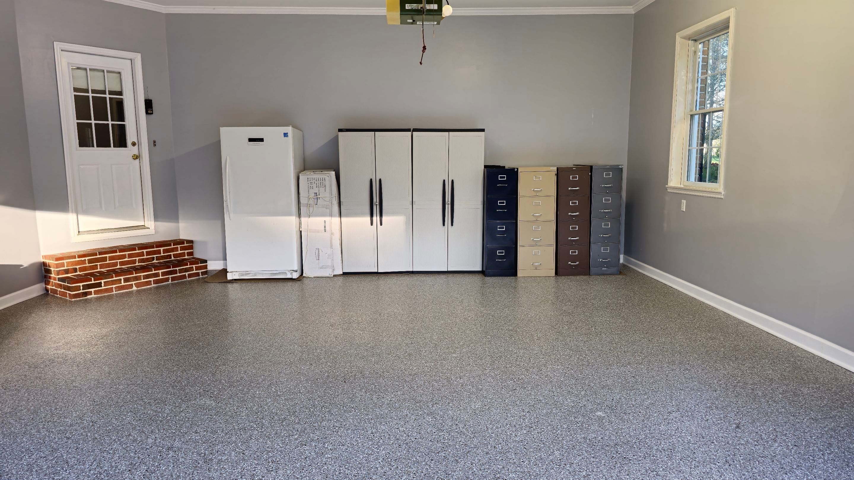 Garage using Creekbed by Elite Floor Solutions