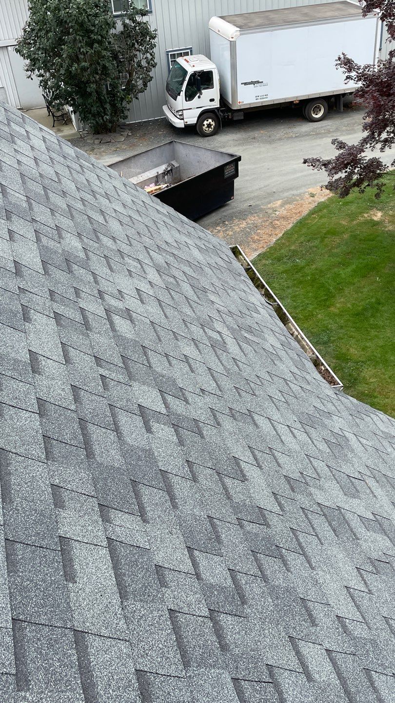 Residential Roofing Installation using OC Oakridge shingles by Top Notch Roofing Inc