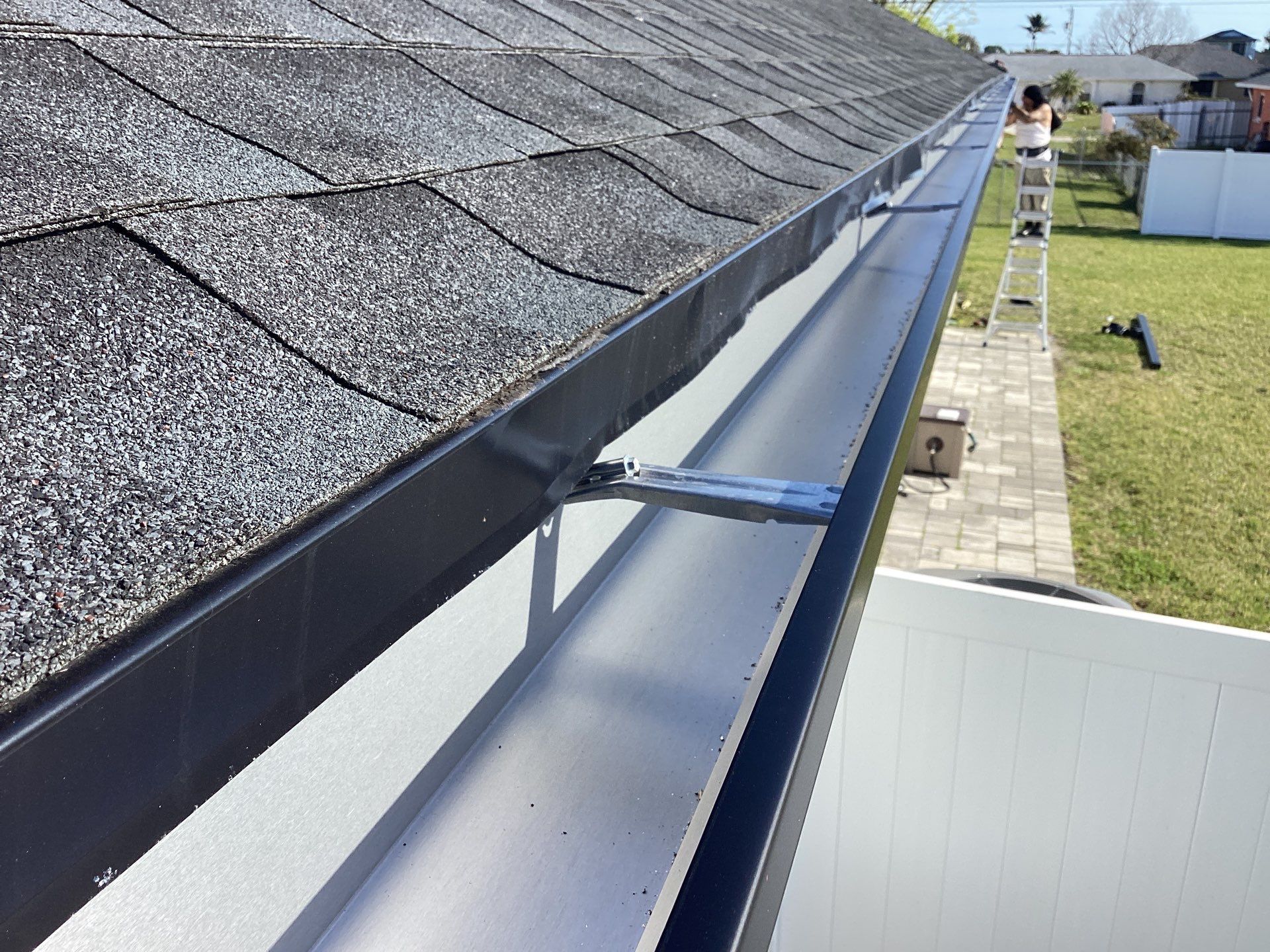 Black Seamless Gutters using 6 Inch Seamless Gutters in Cape Coral FL by Gutter Professors