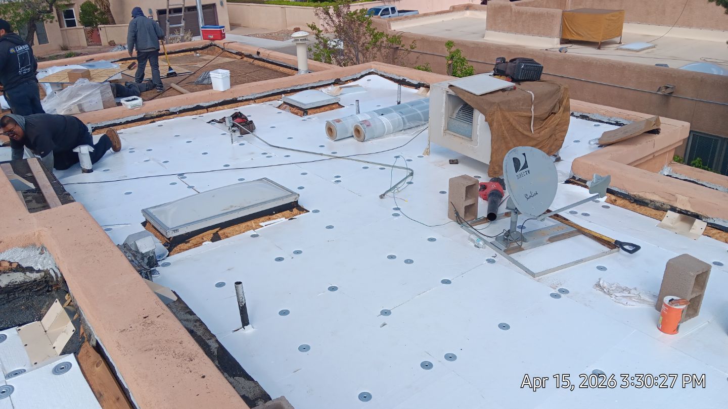 Residential TPO Flat Roof Replacement and Skylight Installation in Albuquerque by Doyle Roof Masters Inc