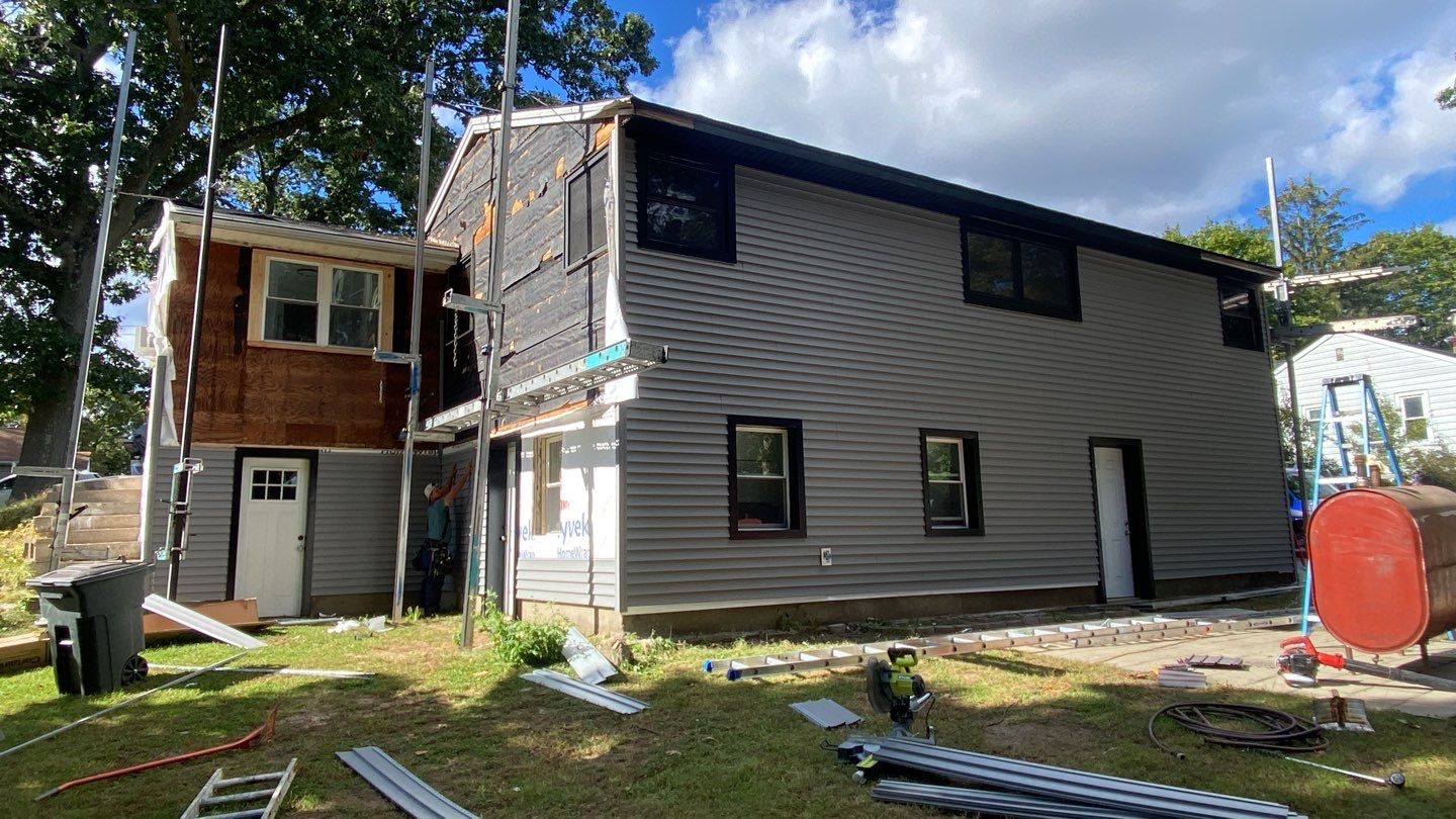 Siding Installation using Certainteed monogram charcoal gray Owens Corning Onyx Black by A Plus Exterior