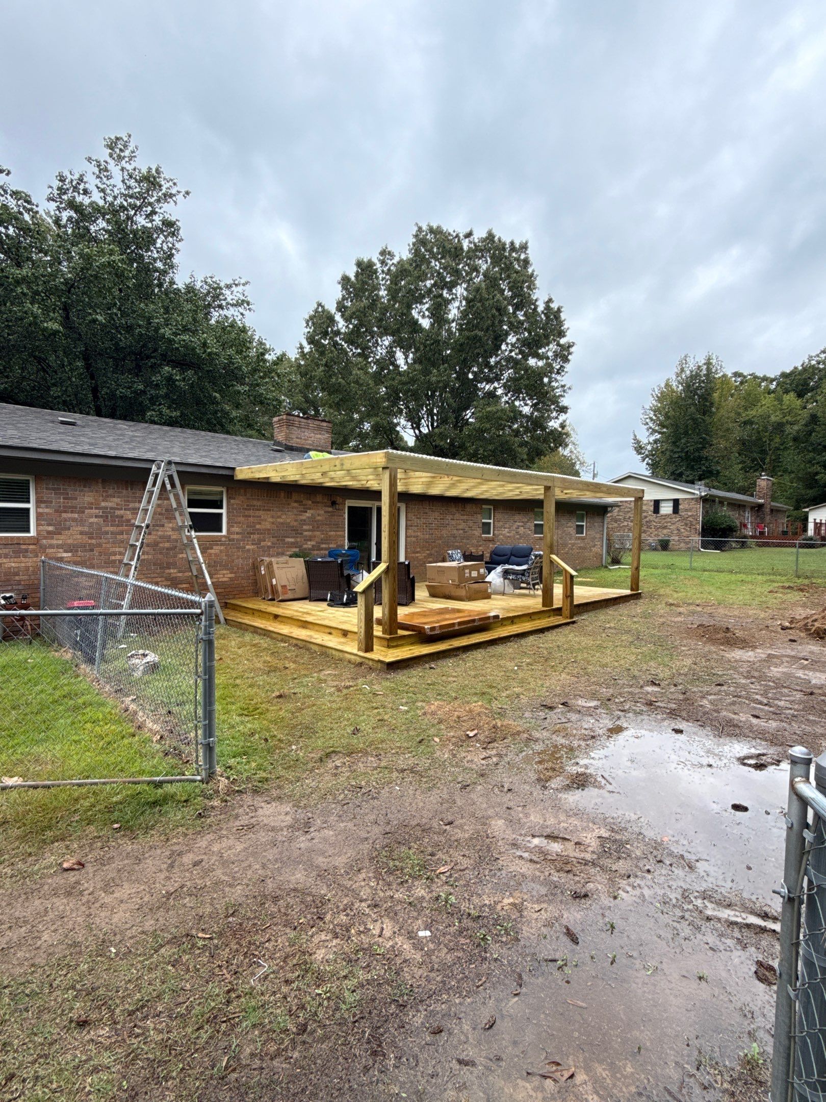Front Entry Enhancements and a Back Deck Upgrade by Elite Proscapes LLC