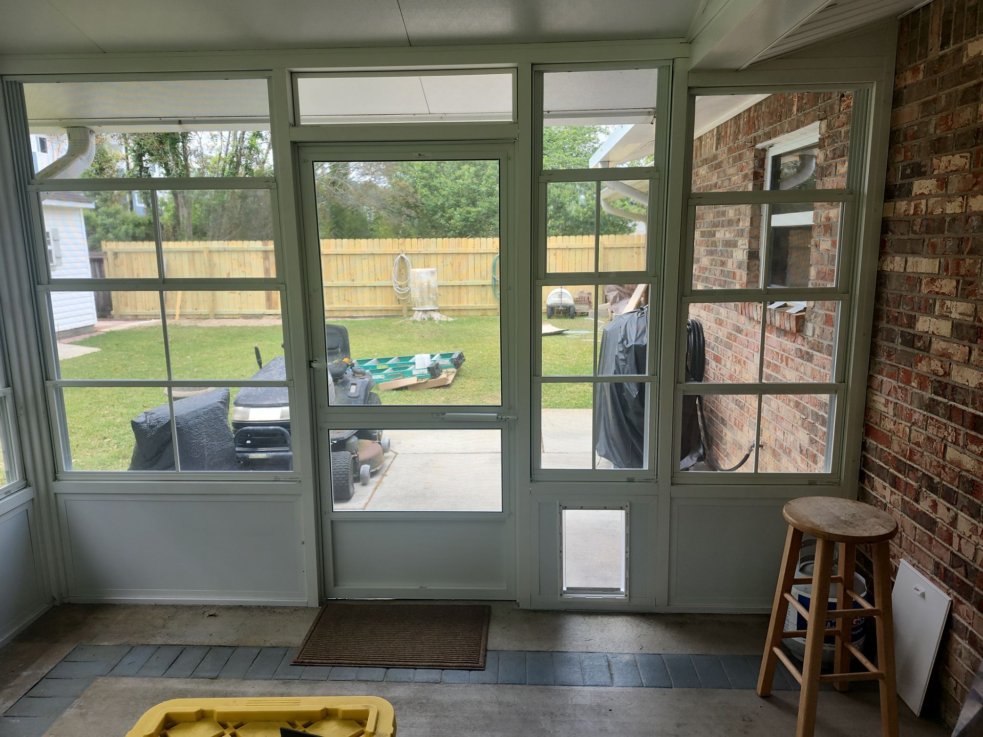Enclosure with Vinyl Windows using Colorbeam by Titan Sunrooms