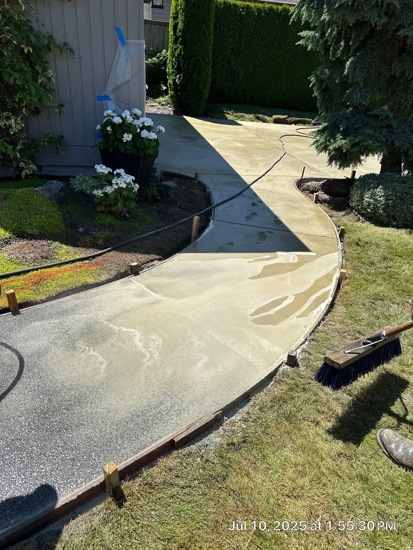 Exposed Aggregate Concrete Driveway Makeover  by Jireh Asphalt & Concrete Inc 