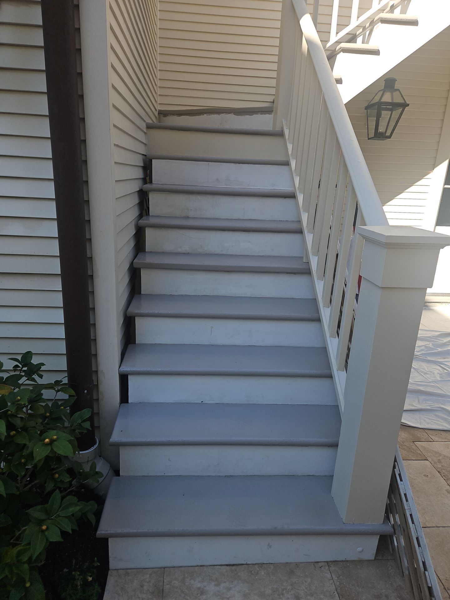 Painting of stairwell by King Cole Construction