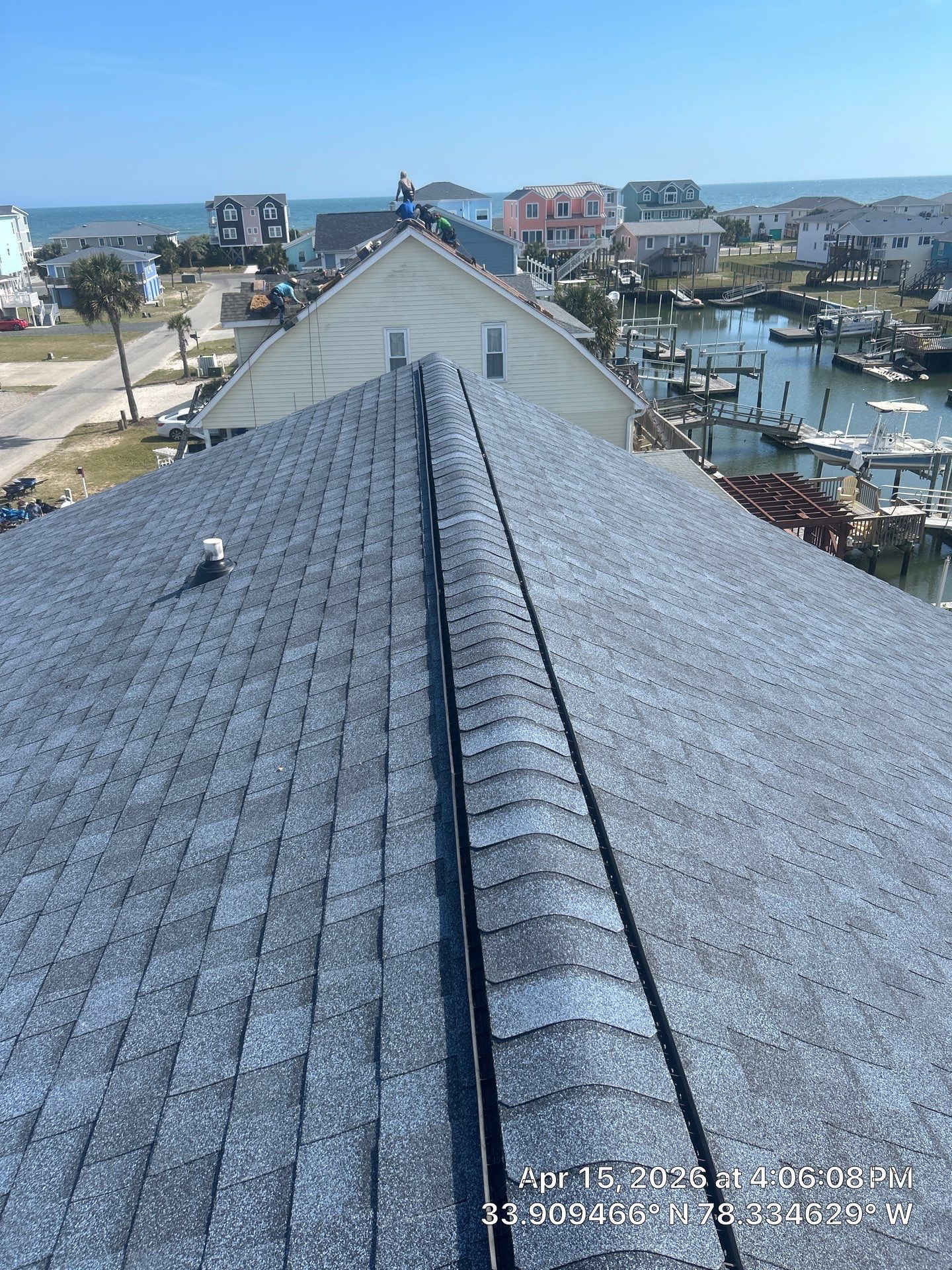 Holden Beach Canal-Side FORTIFIED Roof Replacement with Coastal Blue Shingles by RGR Construction and Roofing, LLC