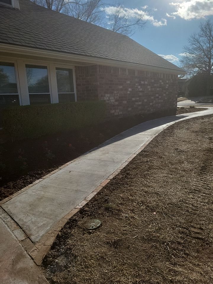 Concrete sidewalk using Concrete by Clays Services Inc