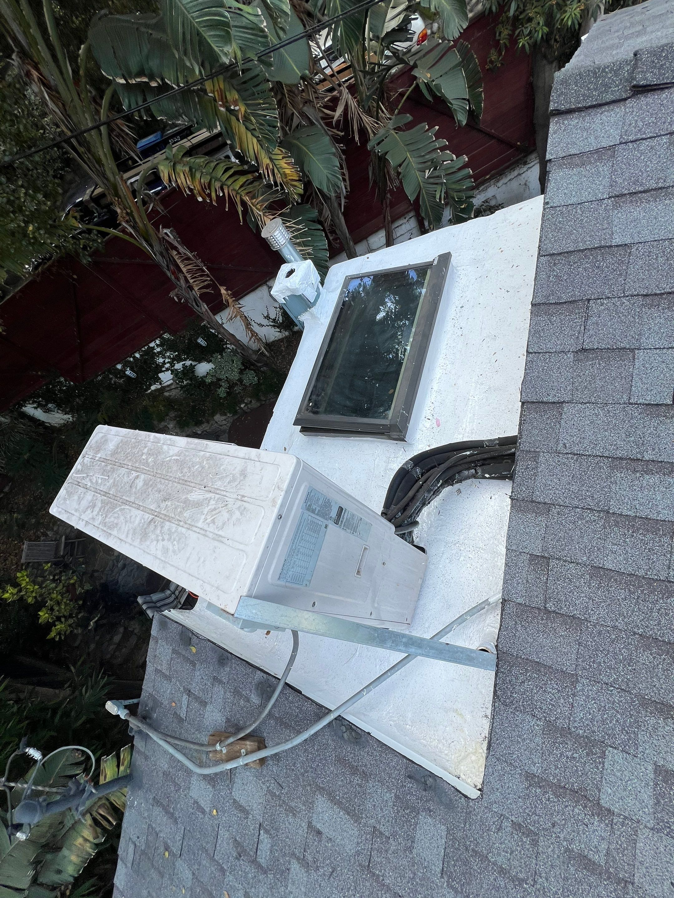Residential Roofing Installation using Shingles and Silicone by Hull Brothers Roofing