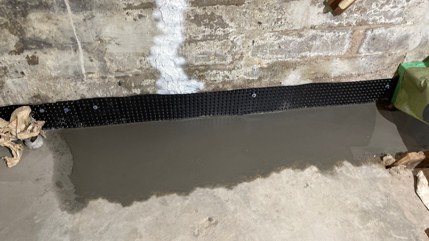 Interior Drain Tile & Foundation Crack Repair in Northeast Minneapolis by Waterproofing Northeast