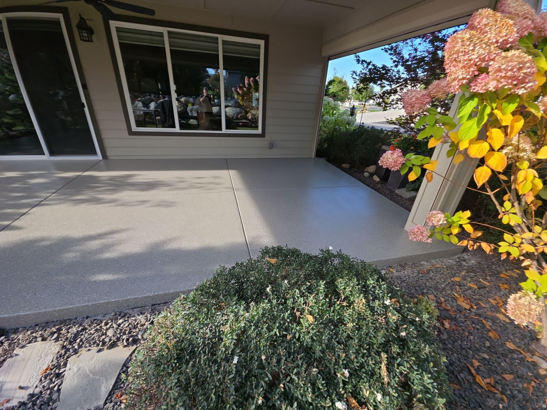 Front Porch and Back Patio Concrete Transformation in Liberty Lake by Croc Coatings, LLC