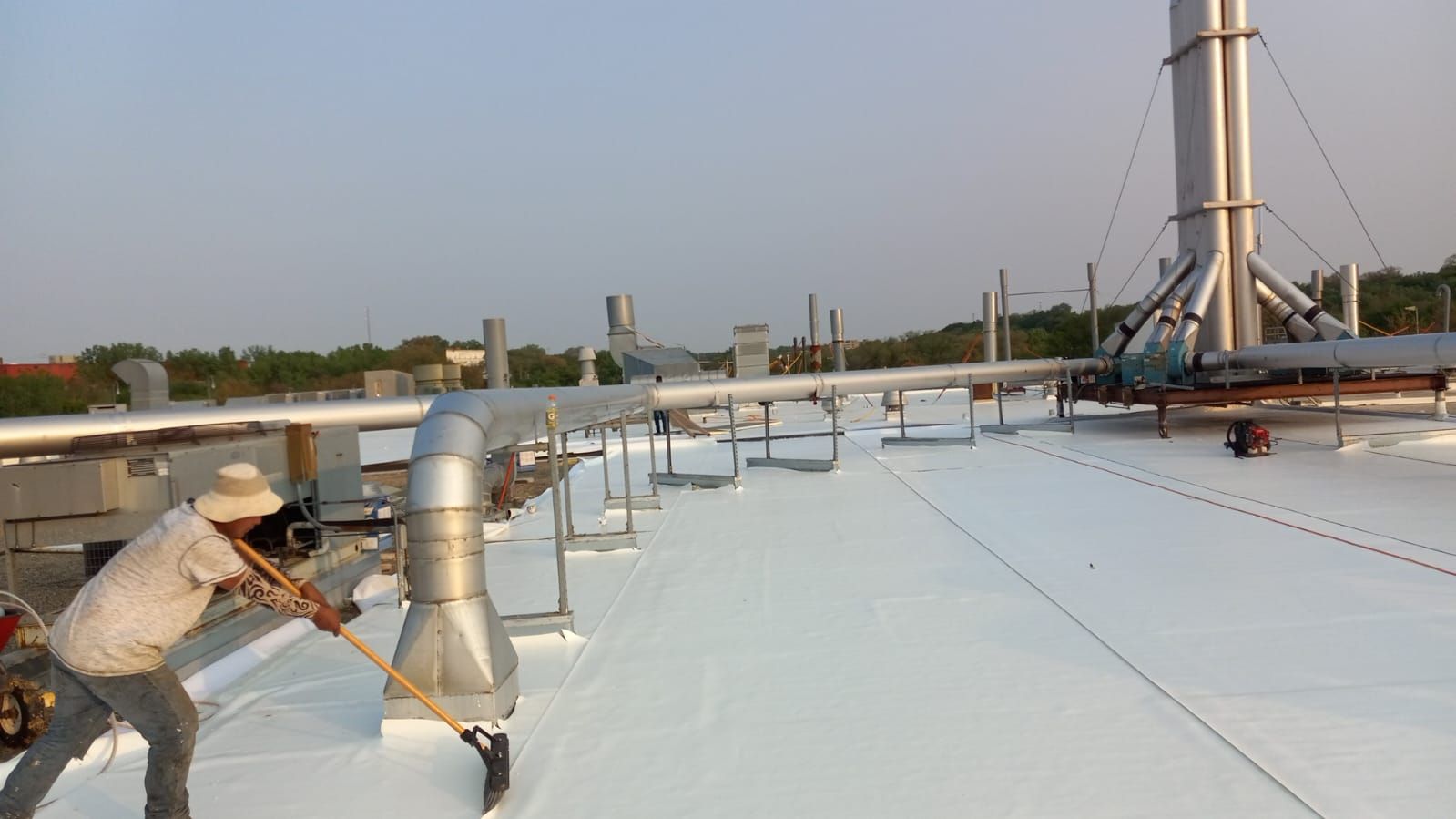 AML Riverside  by Grell Roofing, LLC