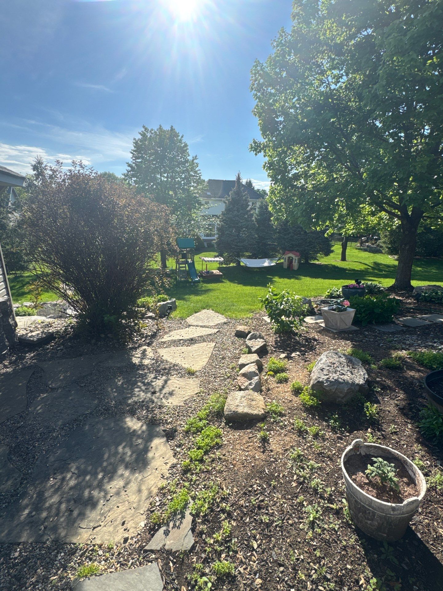 Backyard Retreat: Techo-Bloc Patio + Firepit Lounge by Saylor’s Lawn & Landscape