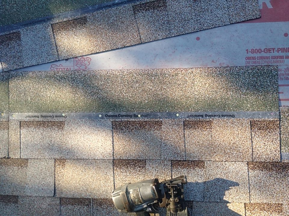 Residential Roofing Installation using Roof Replacement by American Roofing & Construction LLC
