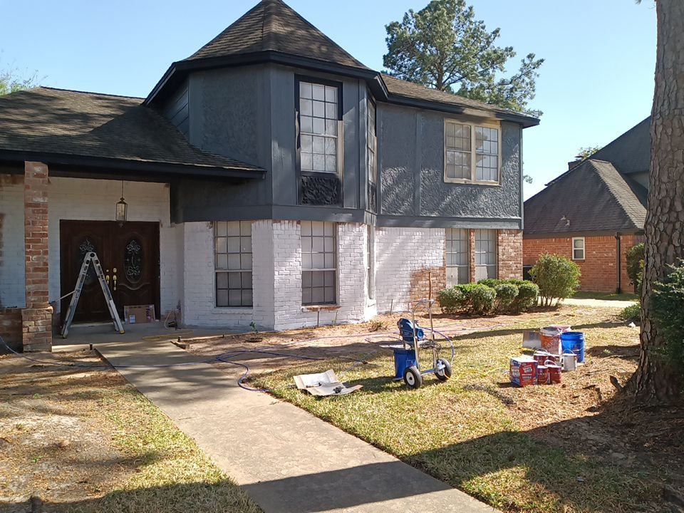 Interior and exterior painting project by Roof Concepts Construction